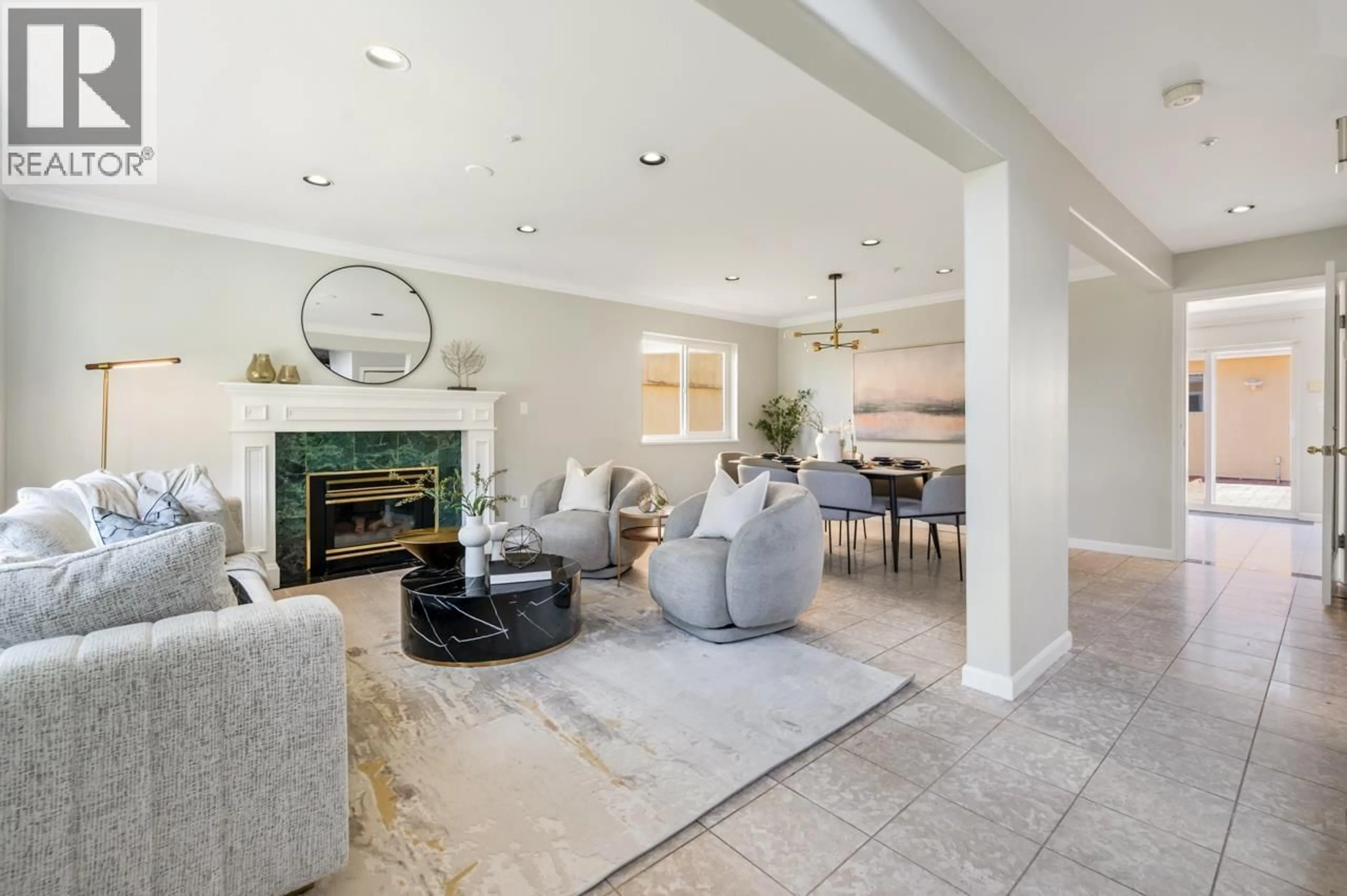 Living room with furniture, ceramic/tile floor for 4110 PENTICTON STREET, Vancouver British Columbia V5R1Y1