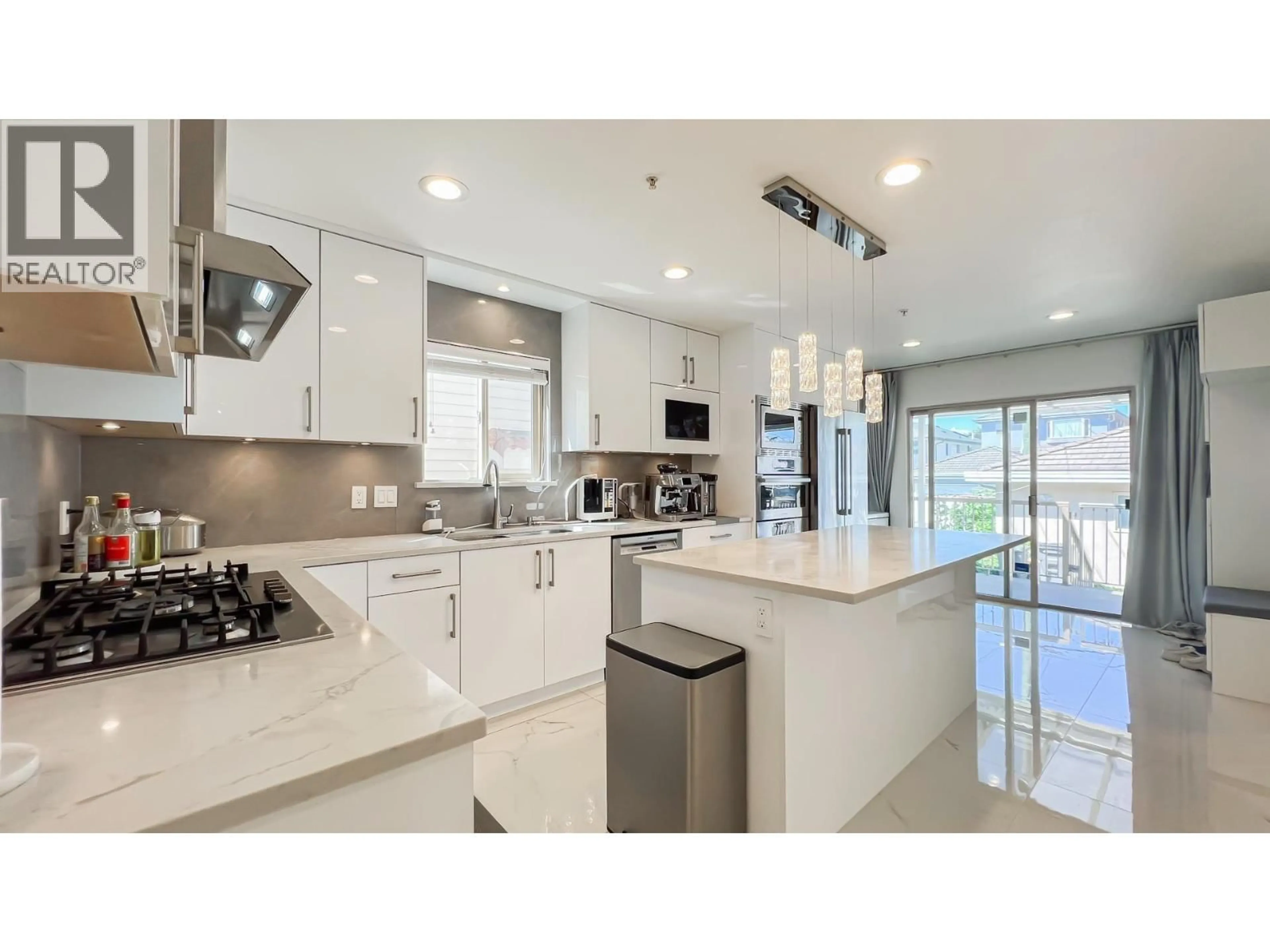 Open concept kitchen, ceramic/tile floor for 2083 53RD AVENUE, Vancouver British Columbia V5P1X6