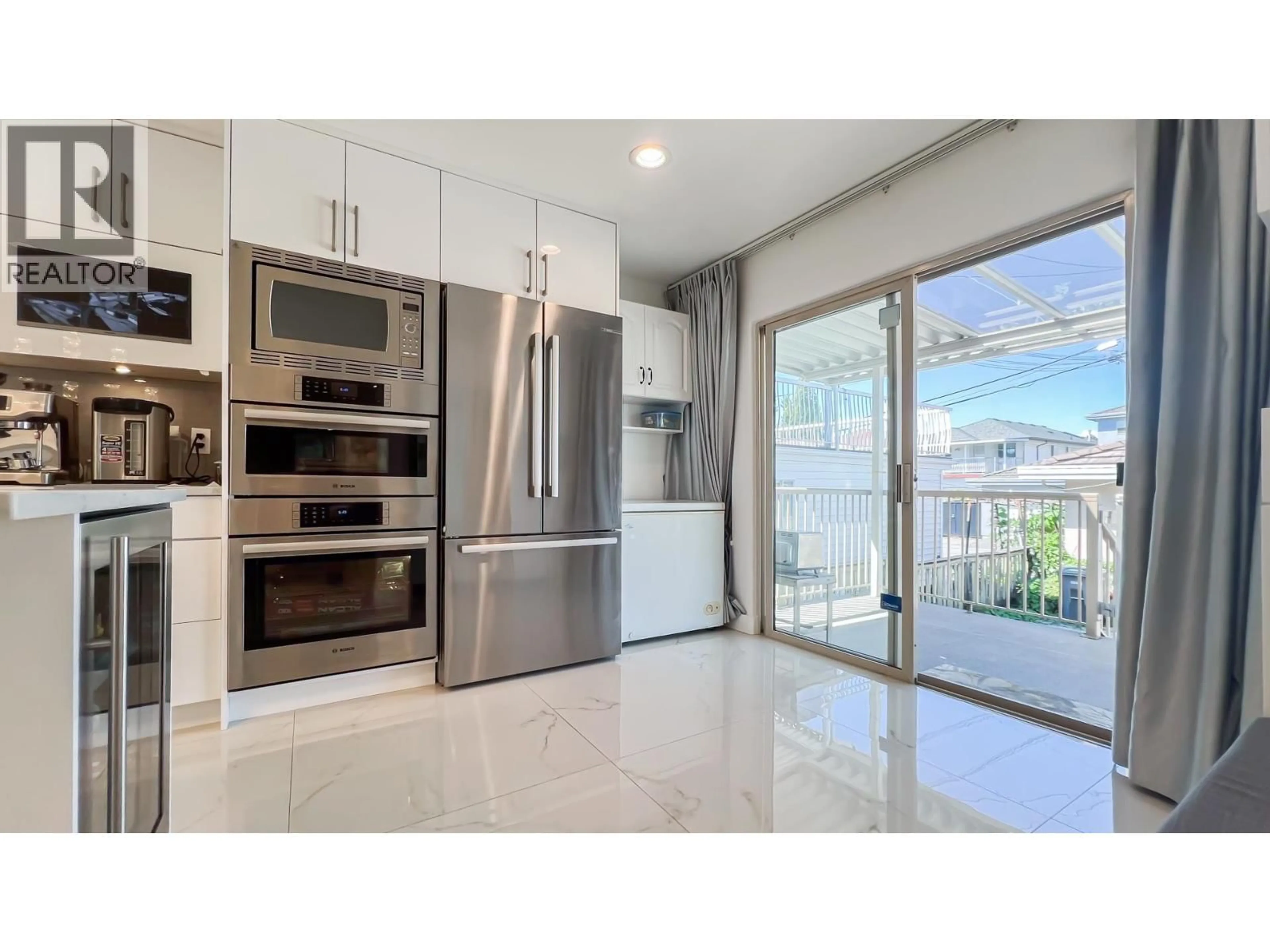 Open concept kitchen, ceramic/tile floor for 2083 53RD AVENUE, Vancouver British Columbia V5P1X6