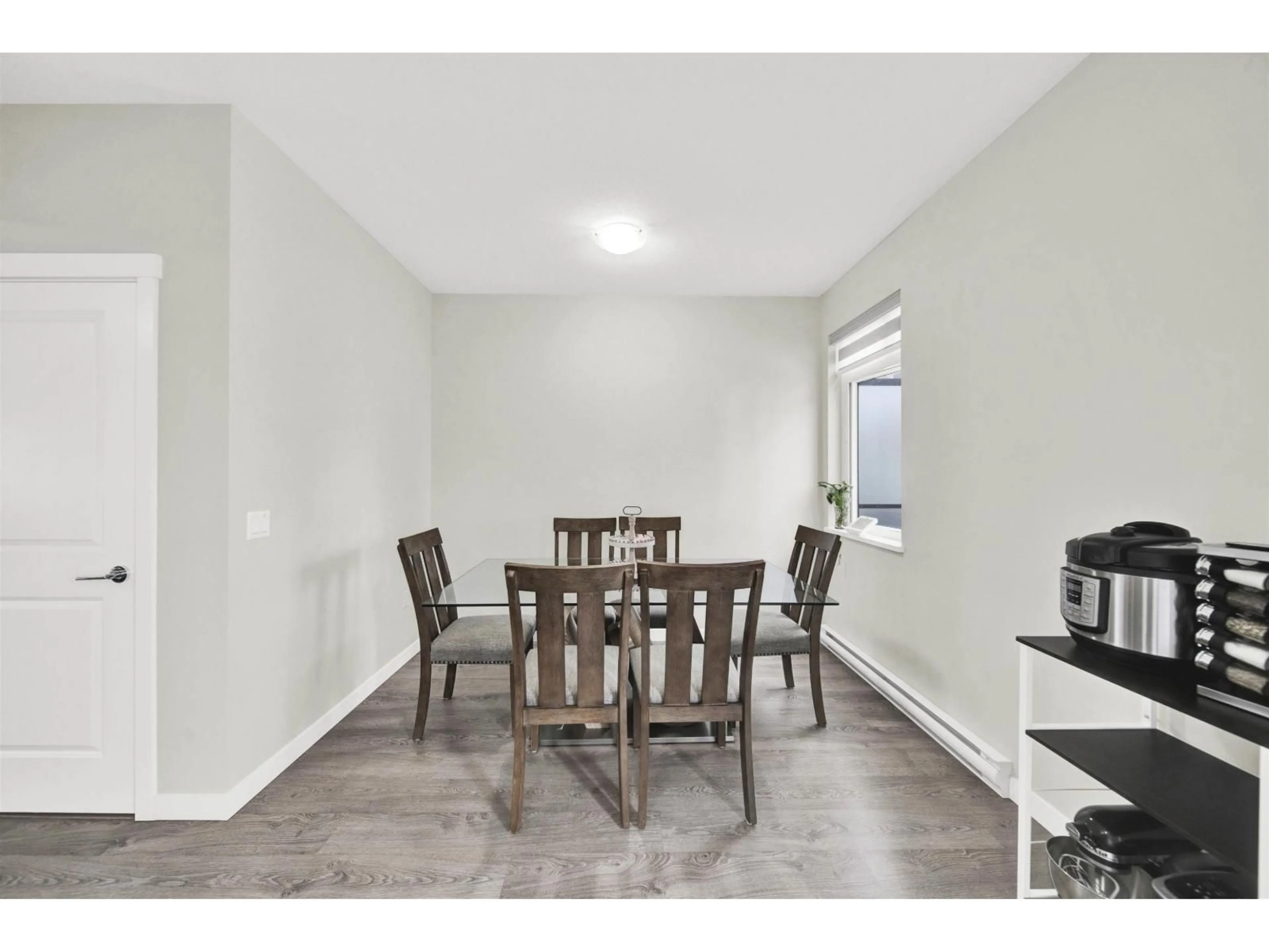 Dining room, wood/laminate floor for 147 - 15111 EDMUND, Surrey British Columbia V3S0A5