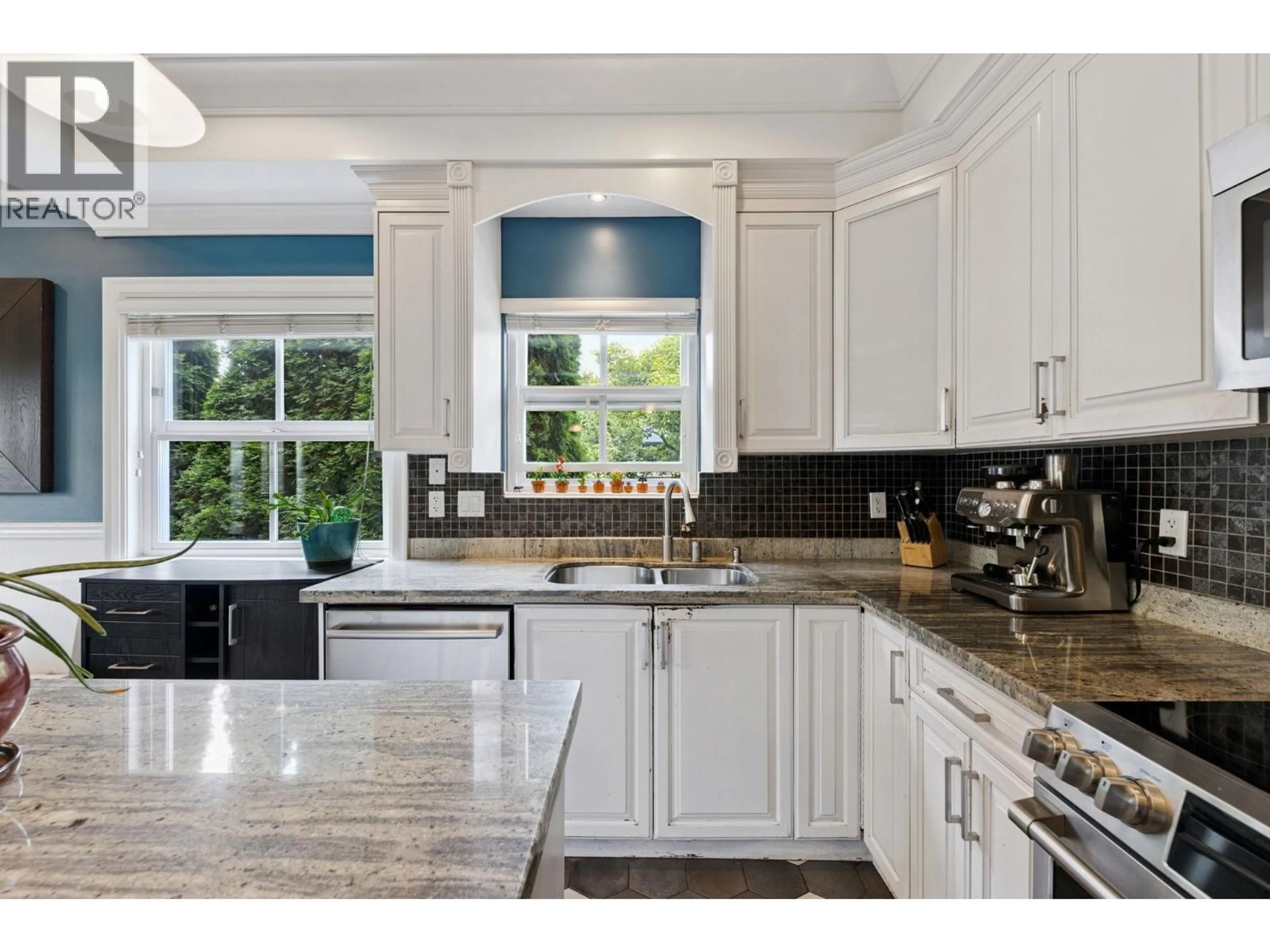 Open concept kitchen, ceramic/tile floor for 4222 GLEN DRIVE, Vancouver British Columbia V5V4T5