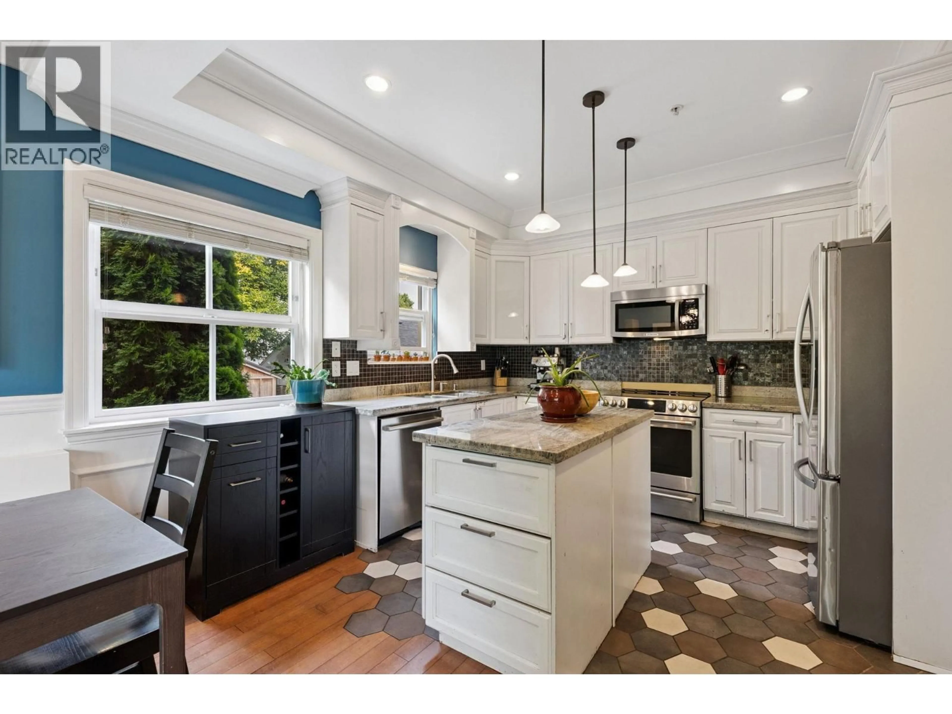 Open concept kitchen, ceramic/tile floor for 4222 GLEN DRIVE, Vancouver British Columbia V5V4T5