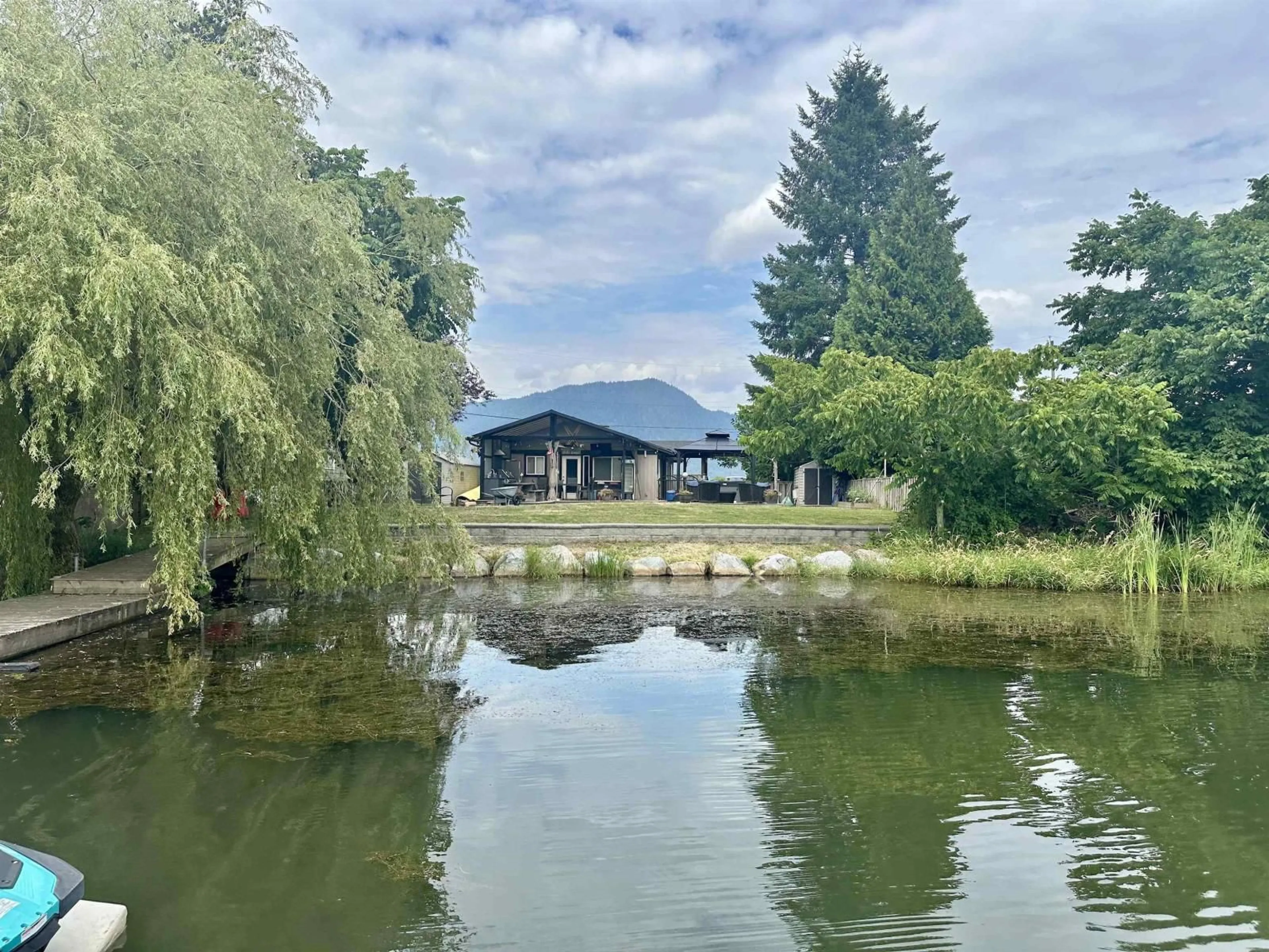 A pic from outside/outdoor area/front of a property/back of a property/a pic from drone, water/lake/river/ocean view for 35218 SWARD, Mission British Columbia V2V4J1