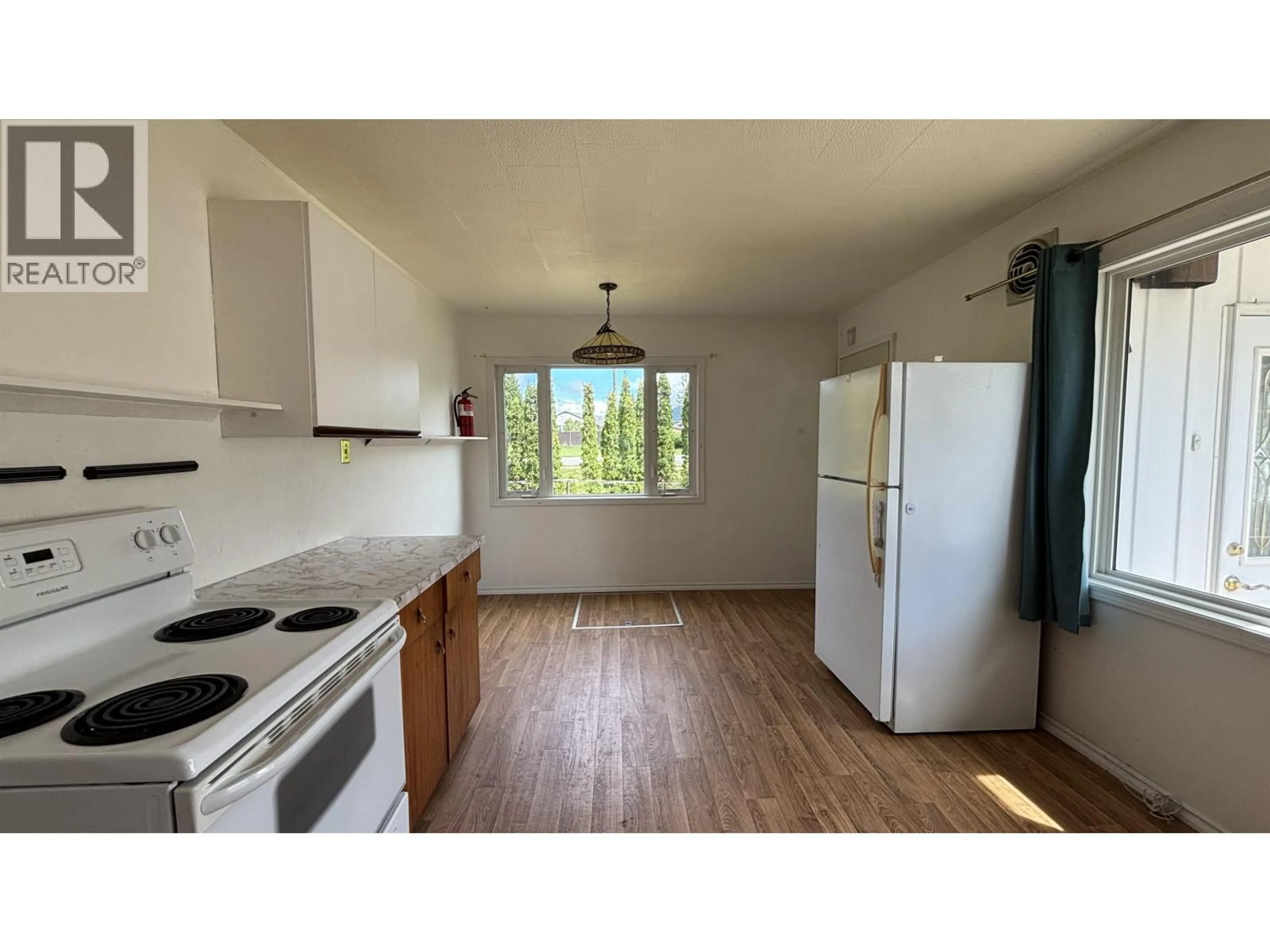 Standard kitchen, wood/laminate floor for 23 FINCH STREET, Kitimat British Columbia V8C1T1