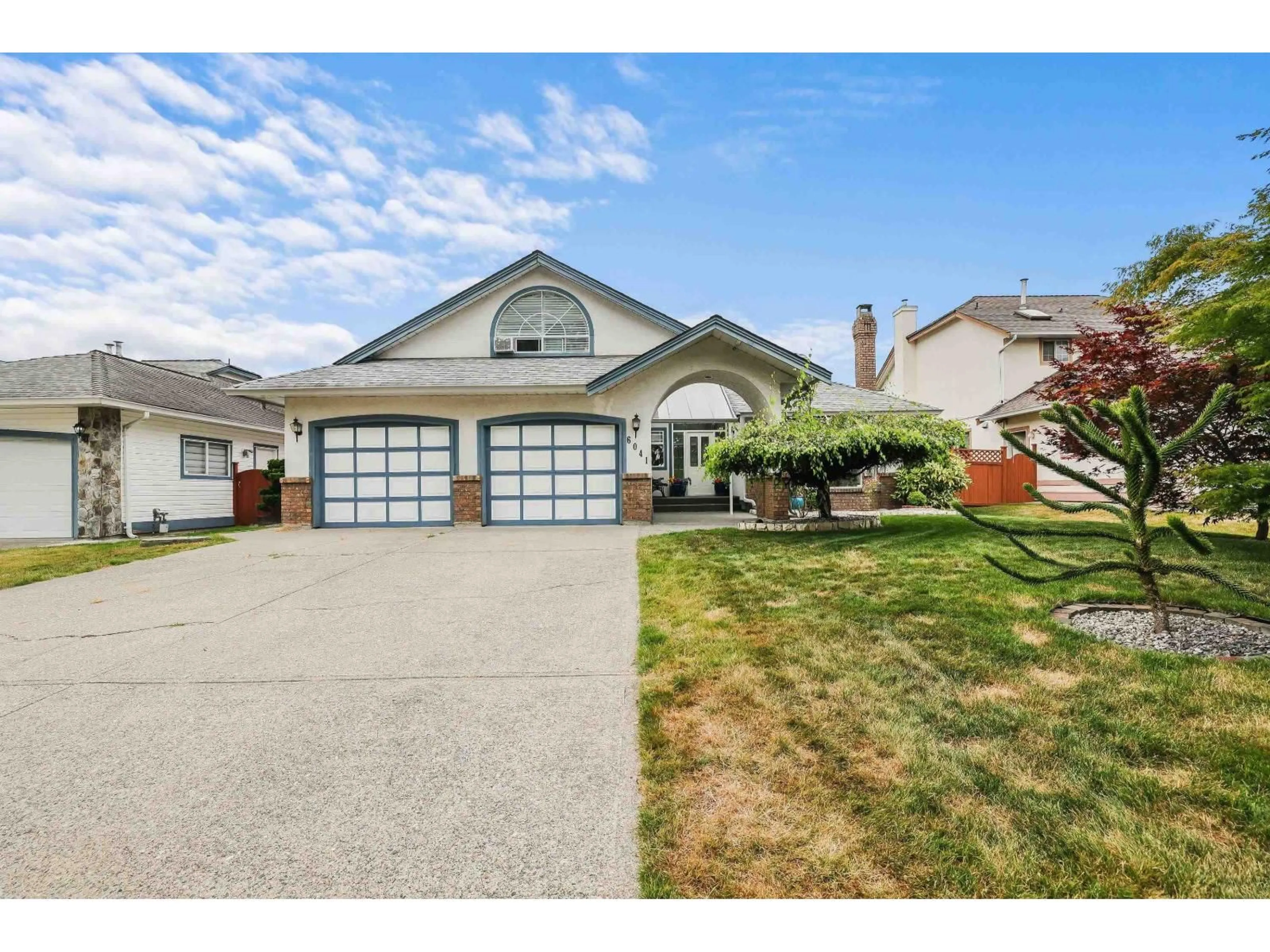 Home with vinyl exterior material, street for 6041 186, Surrey British Columbia V3S7P4
