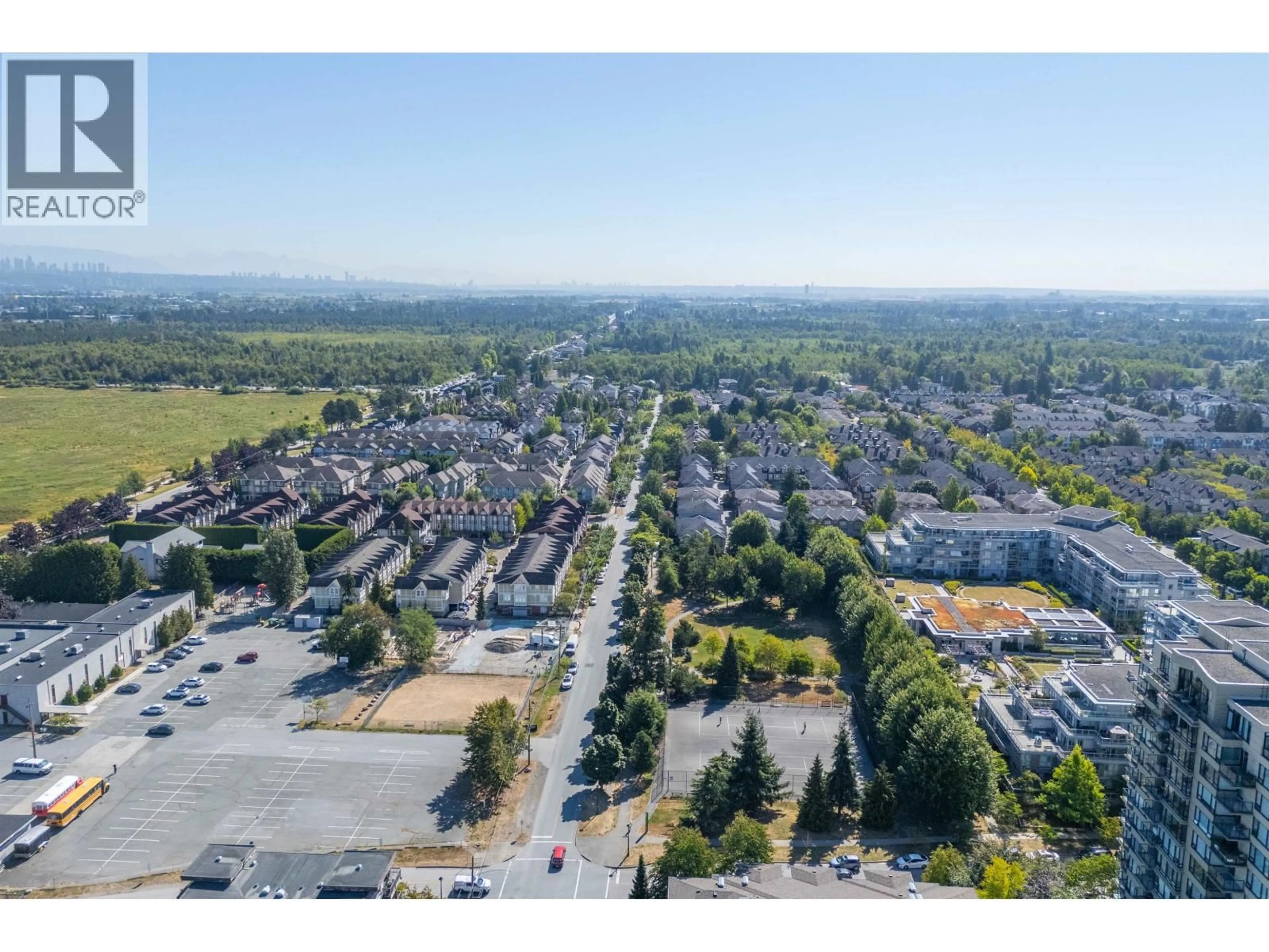 A pic from outside/outdoor area/front of a property/back of a property/a pic from drone, mountain view for 318 - 9200 FERNDALE ROAD, Richmond British Columbia V6Y4L2