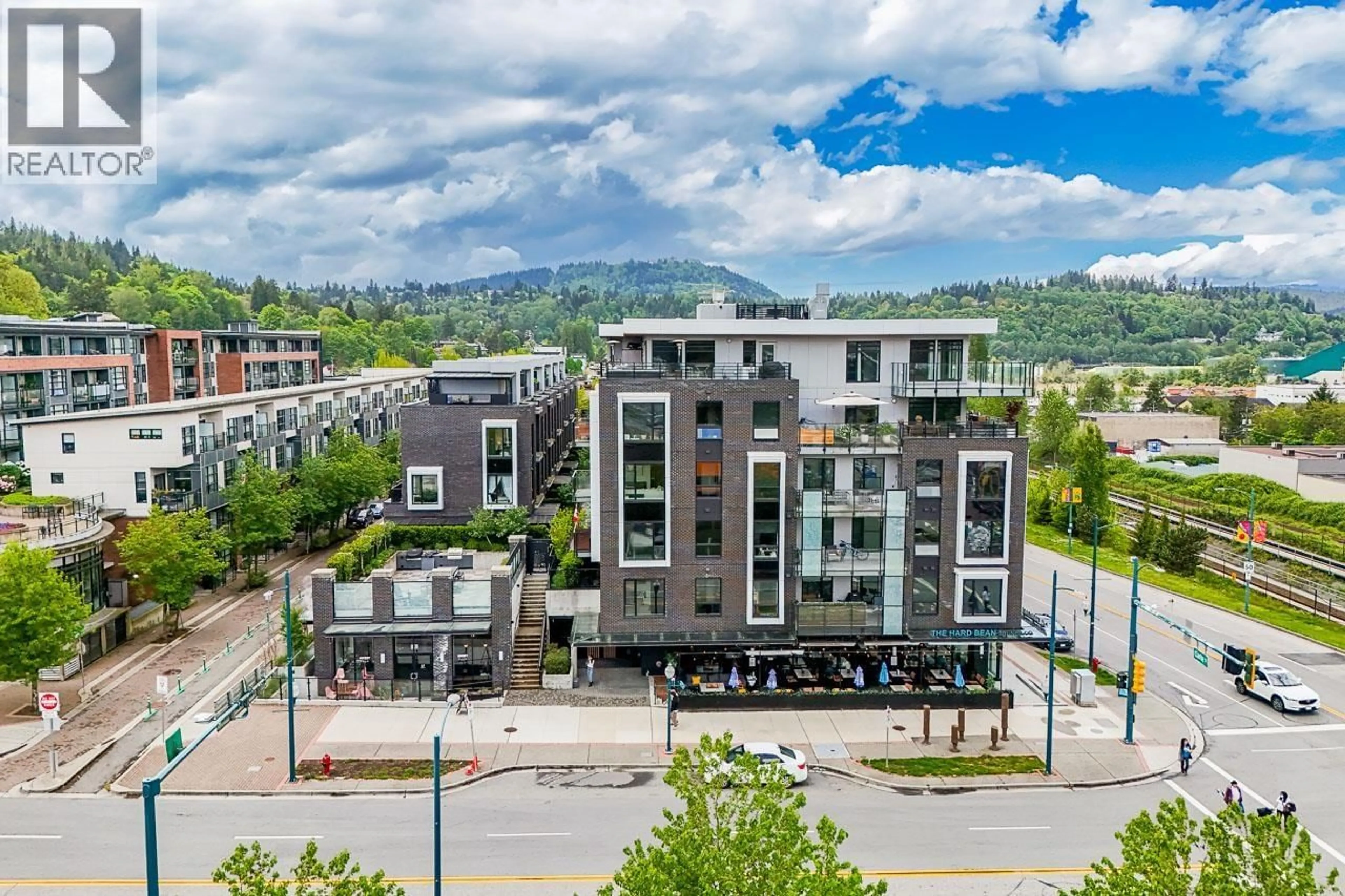 A pic from outside/outdoor area/front of a property/back of a property/a pic from drone, mountain view for 1 - 83 MOODY STREET, Port Moody British Columbia V3H0K7