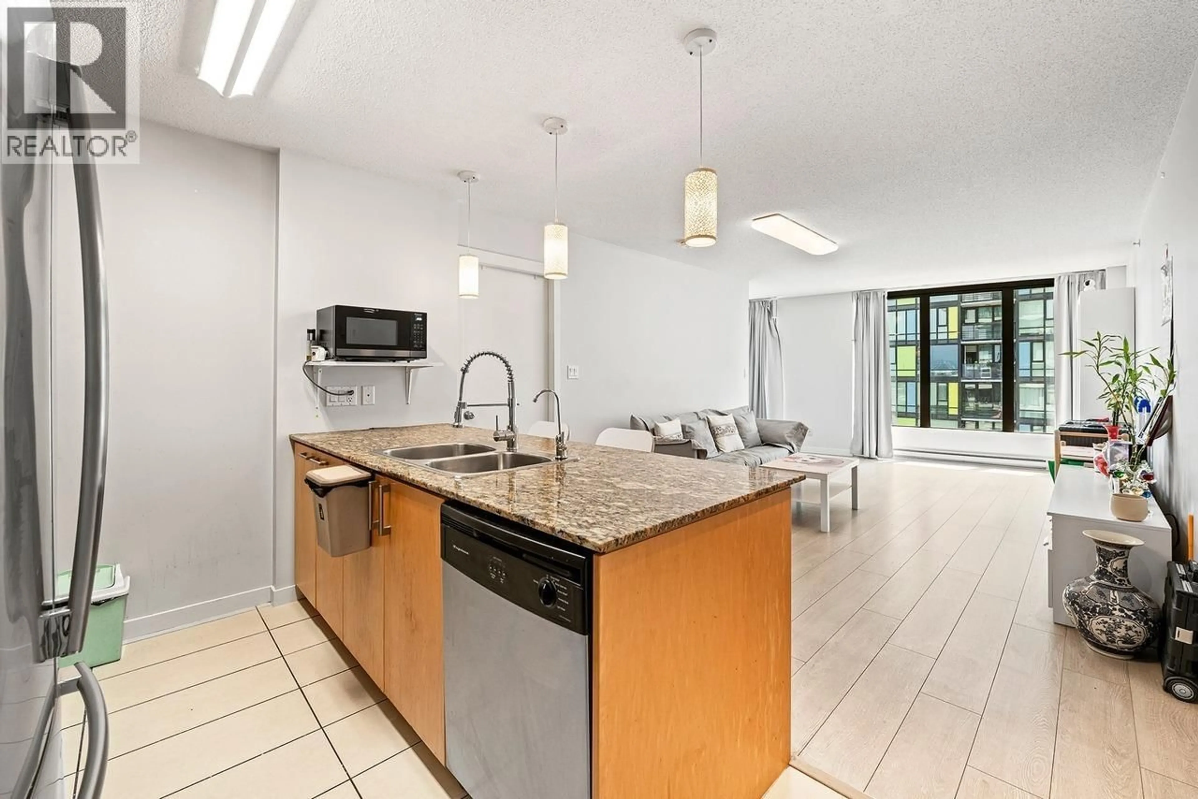 Open concept kitchen, ceramic/tile floor for 1010 - 5811 NO. 3 ROAD, Richmond British Columbia V6X4L4