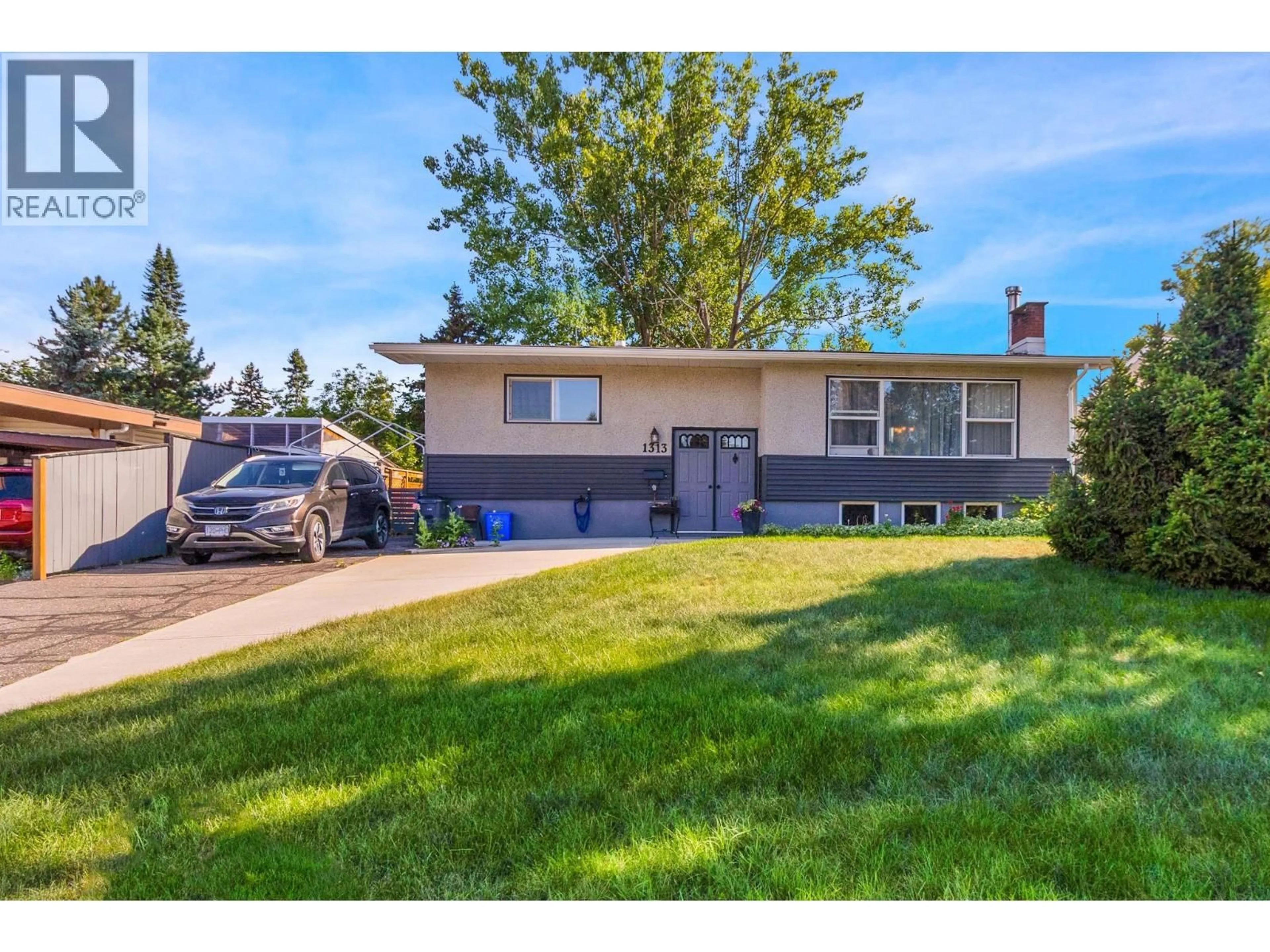 Home with vinyl exterior material, street for 1313 PARSNIP CRESCENT, Prince George British Columbia V2M4C5
