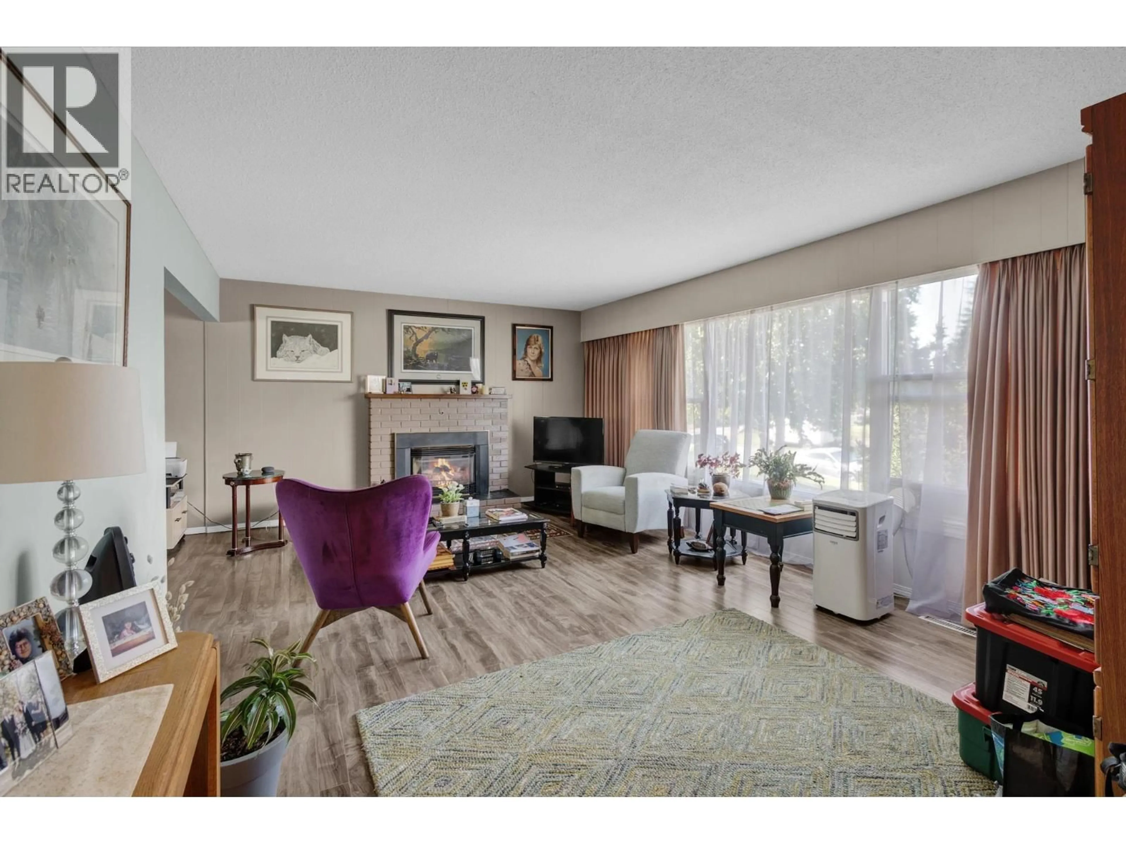 Living room with furniture, wood/laminate floor for 1313 PARSNIP CRESCENT, Prince George British Columbia V2M4C5