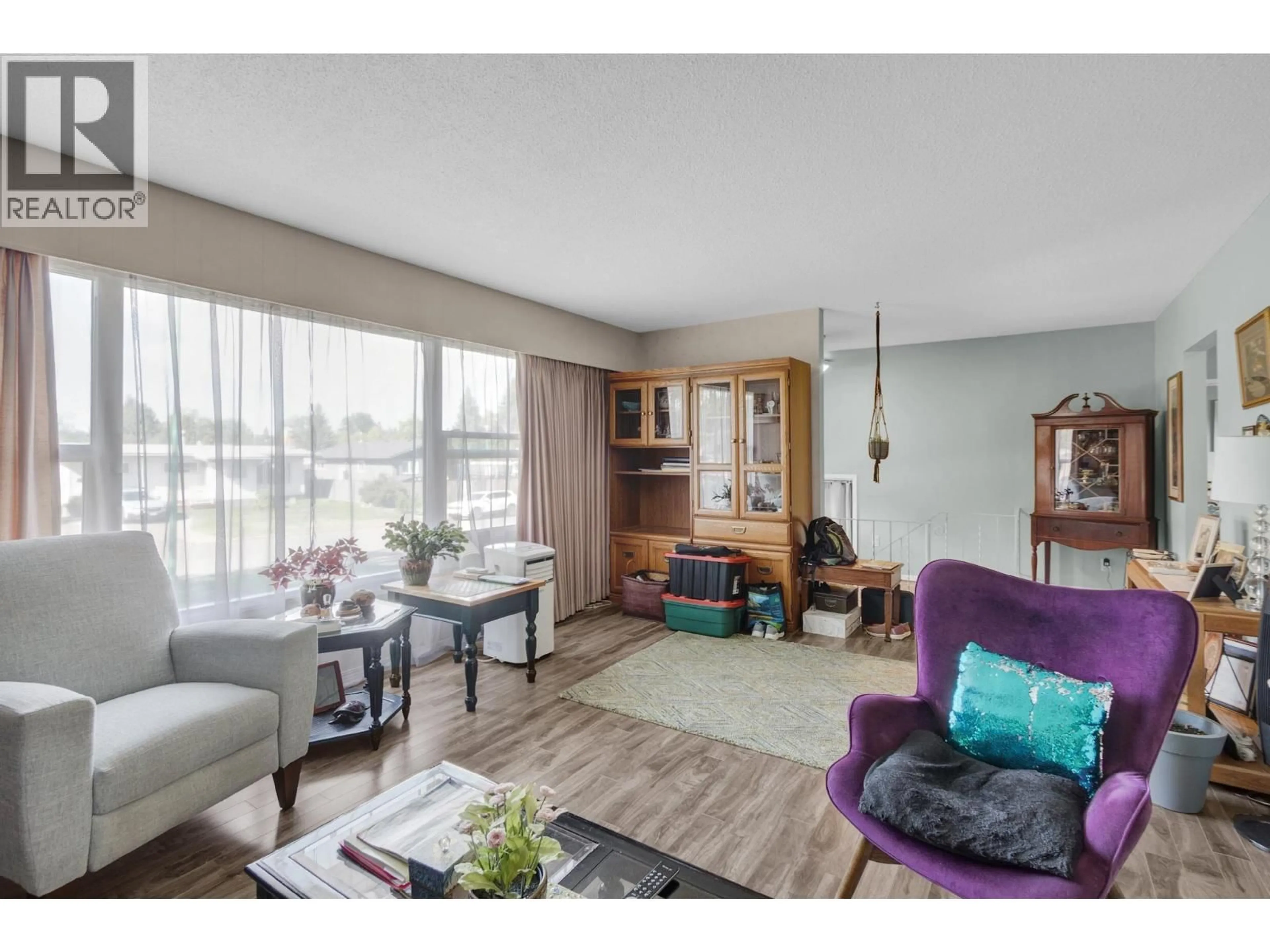Living room with furniture, wood/laminate floor for 1313 PARSNIP CRESCENT, Prince George British Columbia V2M4C5