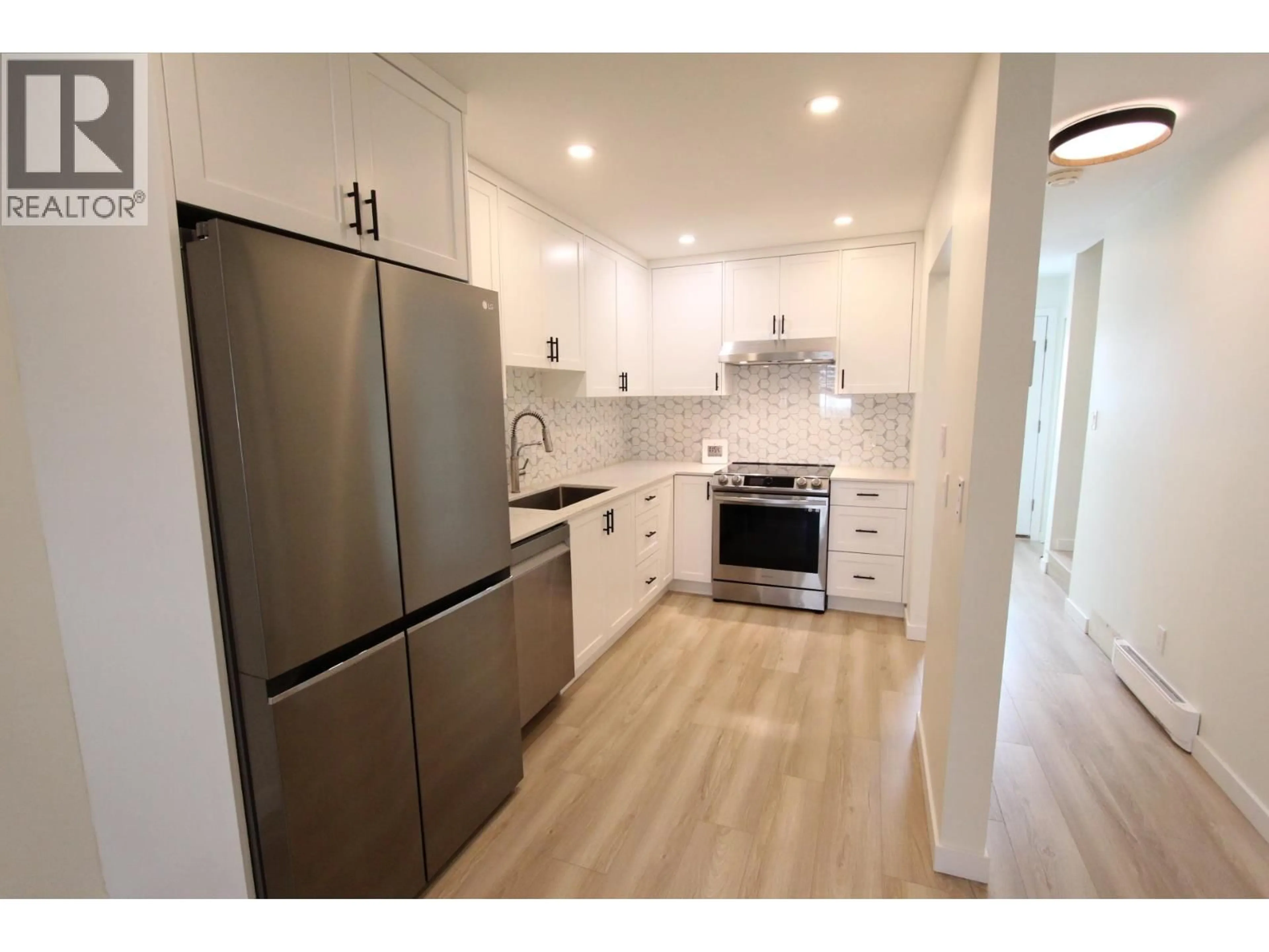 Open concept kitchen, wood/laminate floor for 140 - 12000 1ST AVENUE, Richmond British Columbia V7E3L9