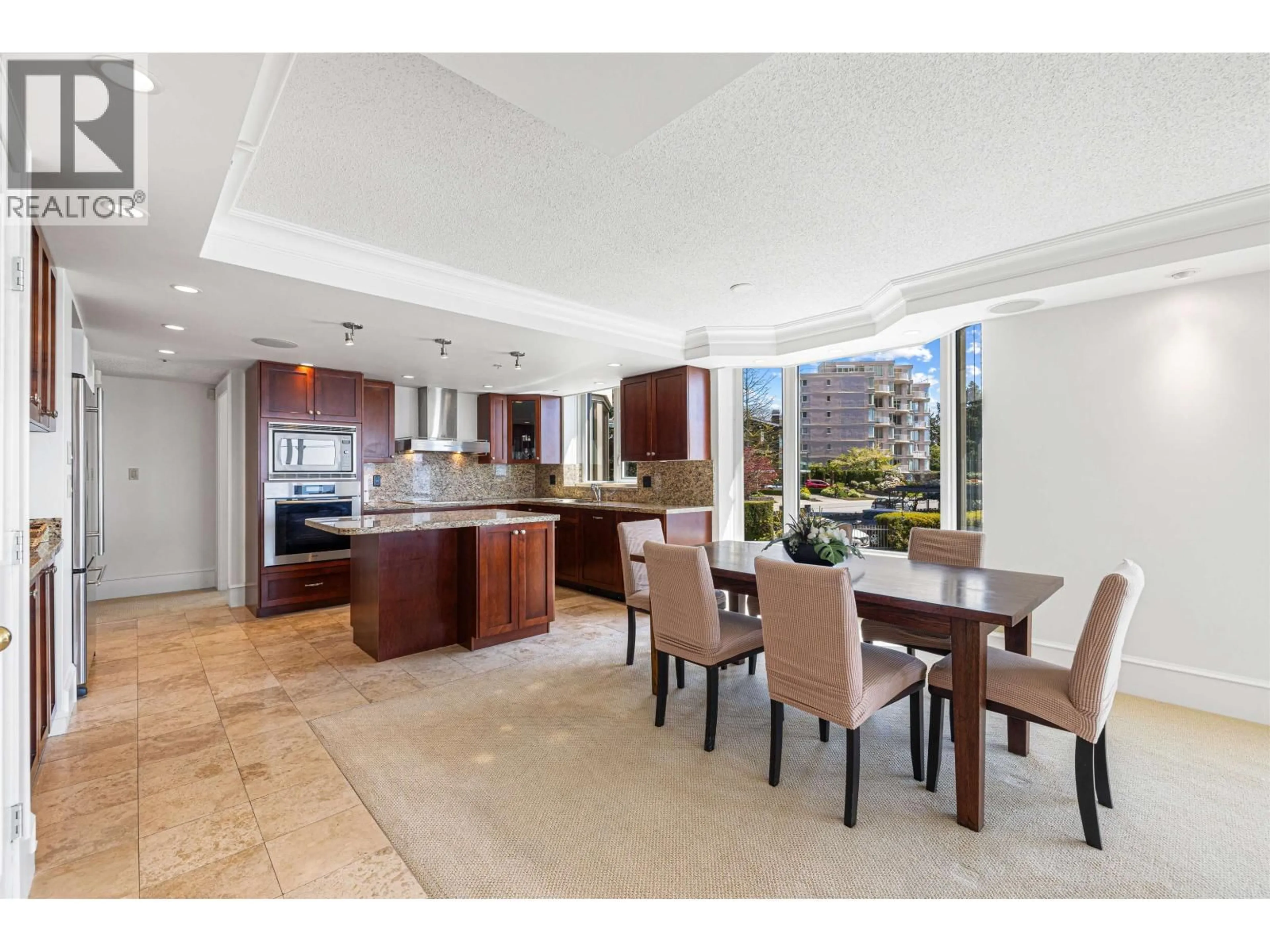 Open concept kitchen, ceramic/tile floor for 101 - 2280 BELLEVUE AVENUE, West Vancouver British Columbia V7V1C6