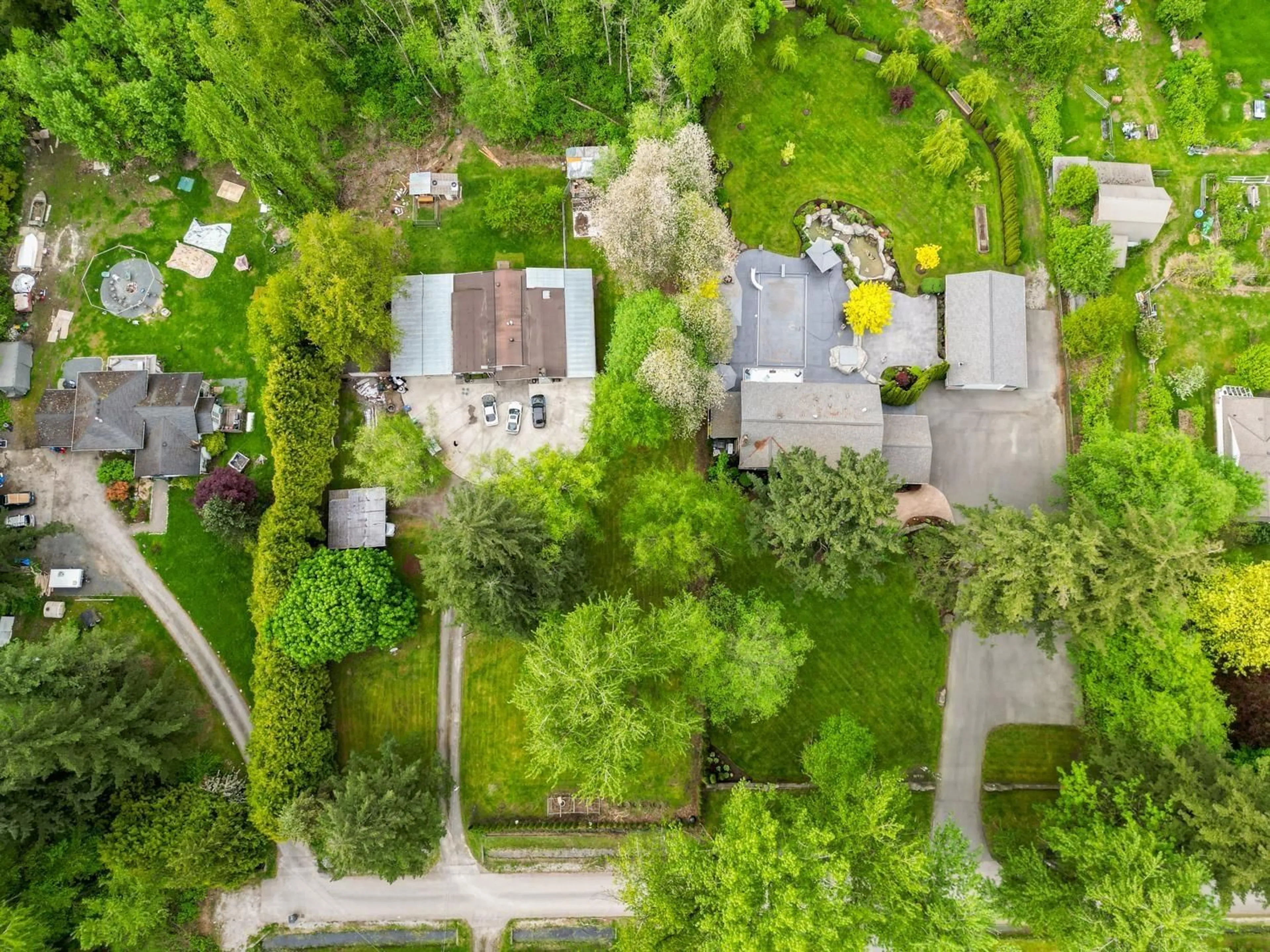 A pic from outside/outdoor area/front of a property/back of a property/a pic from drone, street for 18089 94, Surrey British Columbia V4N4A3
