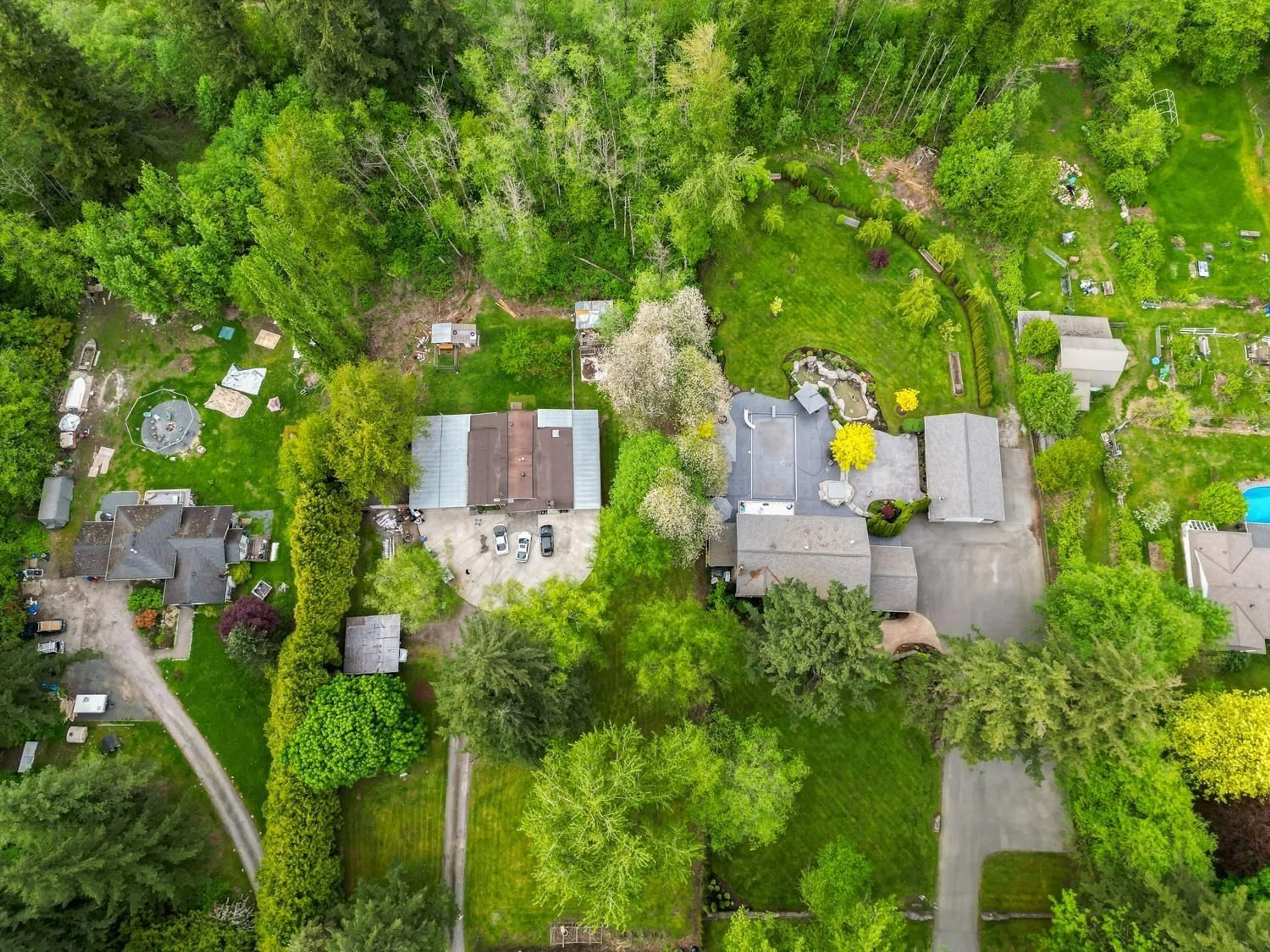 A pic from outside/outdoor area/front of a property/back of a property/a pic from drone, forest/trees view for 18089 94, Surrey British Columbia V4N4A3
