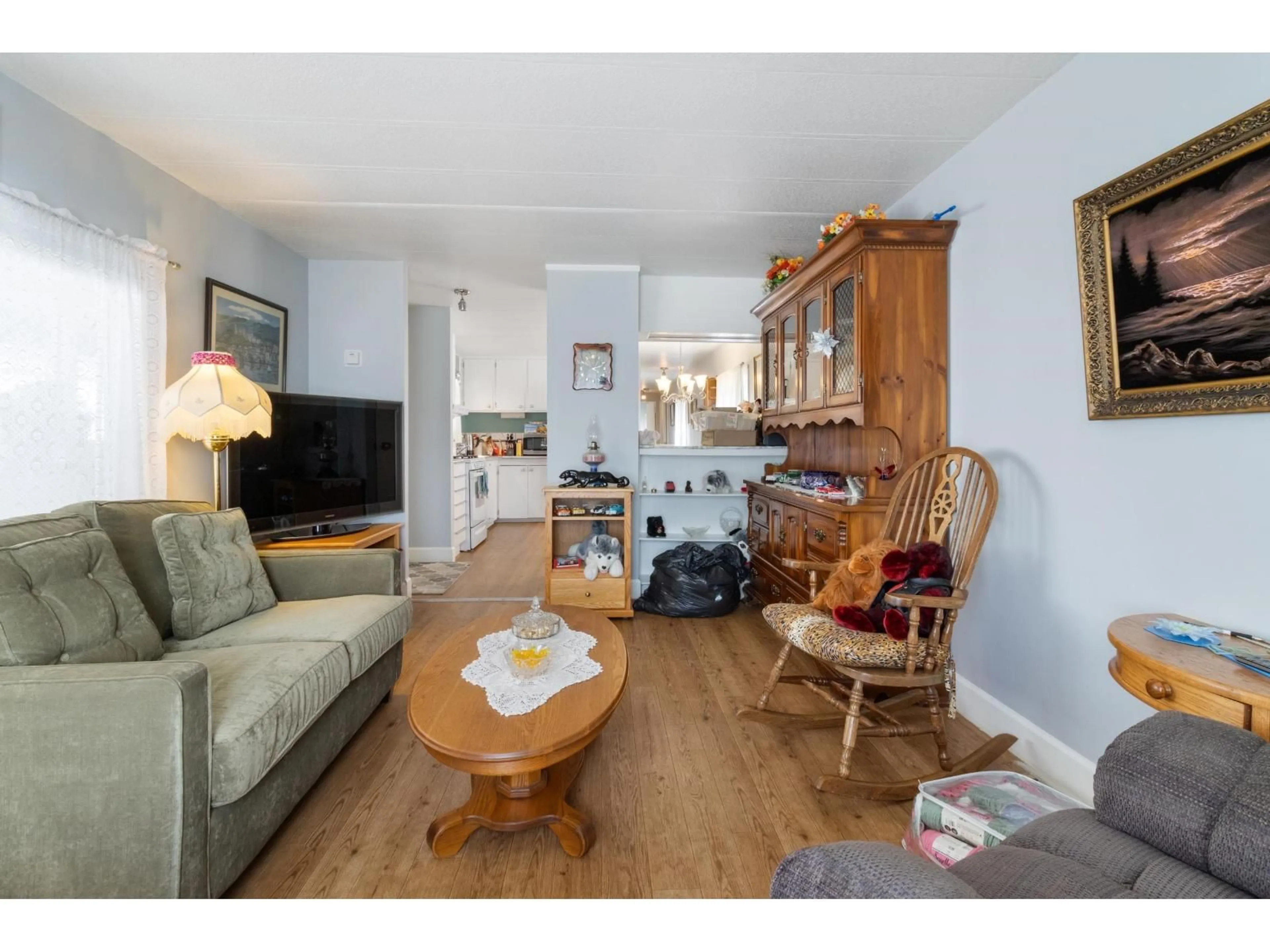 Living room with furniture, wood/laminate floor for 17 - 62780 FLOOD HOPE ROAD, Hope British Columbia V0X1L2