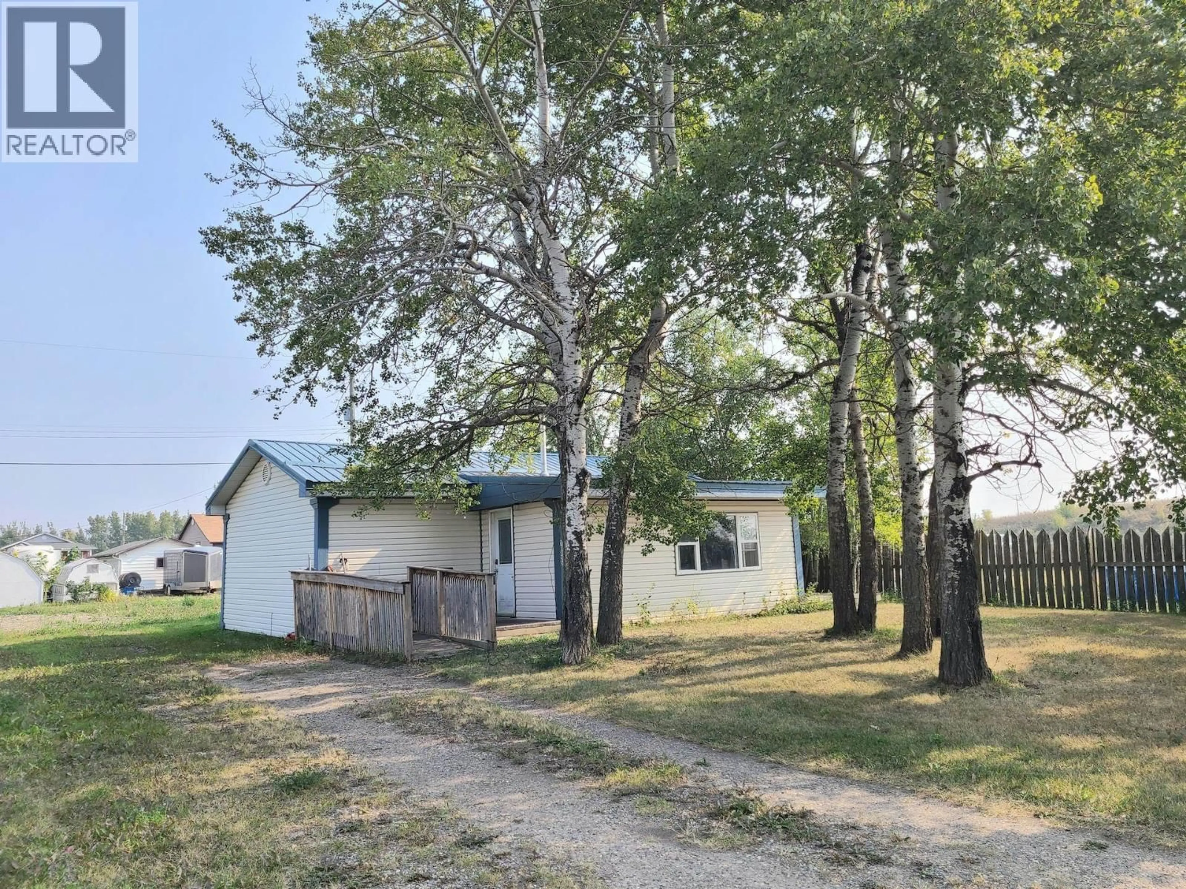 A pic from outside/outdoor area/front of a property/back of a property/a pic from drone, street for 10855 102 STREET, Taylor British Columbia V0C2K0