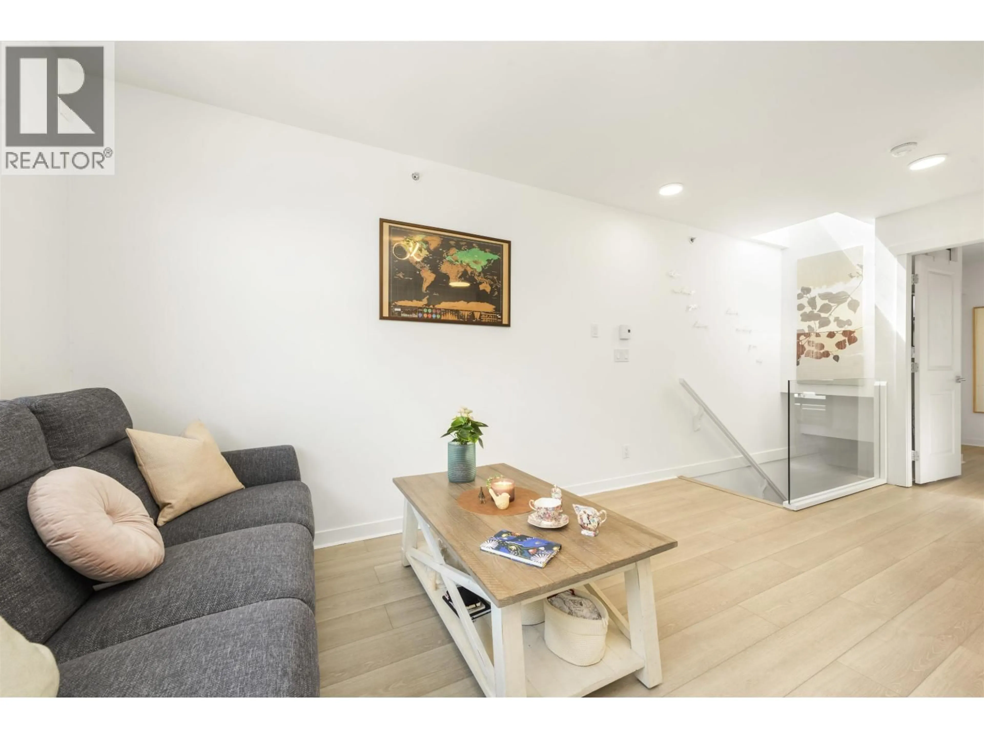 Living room with furniture, wood/laminate floor for 11 - 618 6TH AVENUE, Vancouver British Columbia V5Z1A3