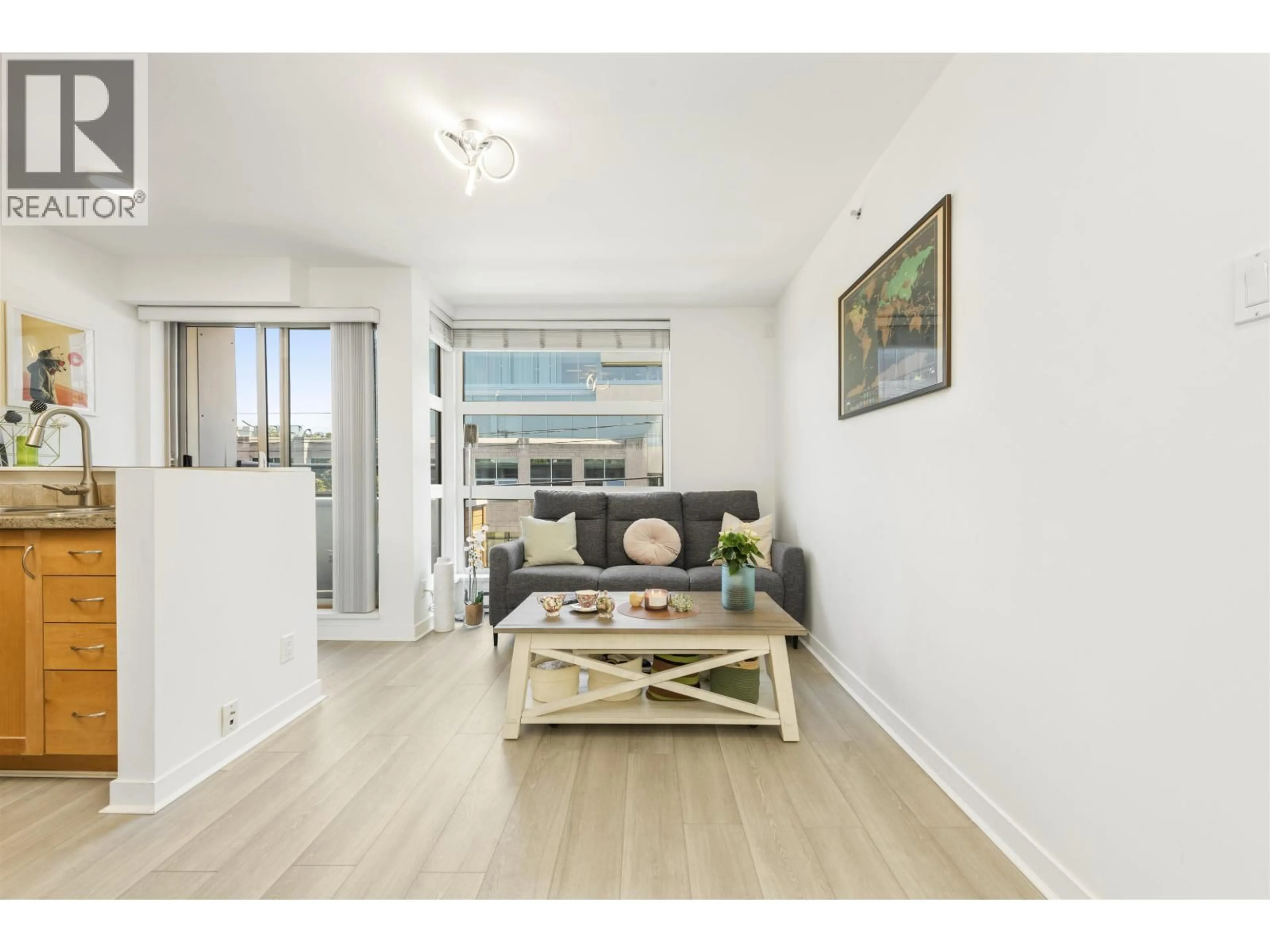 Living room with furniture, wood/laminate floor for 11 - 618 6TH AVENUE, Vancouver British Columbia V5Z1A3