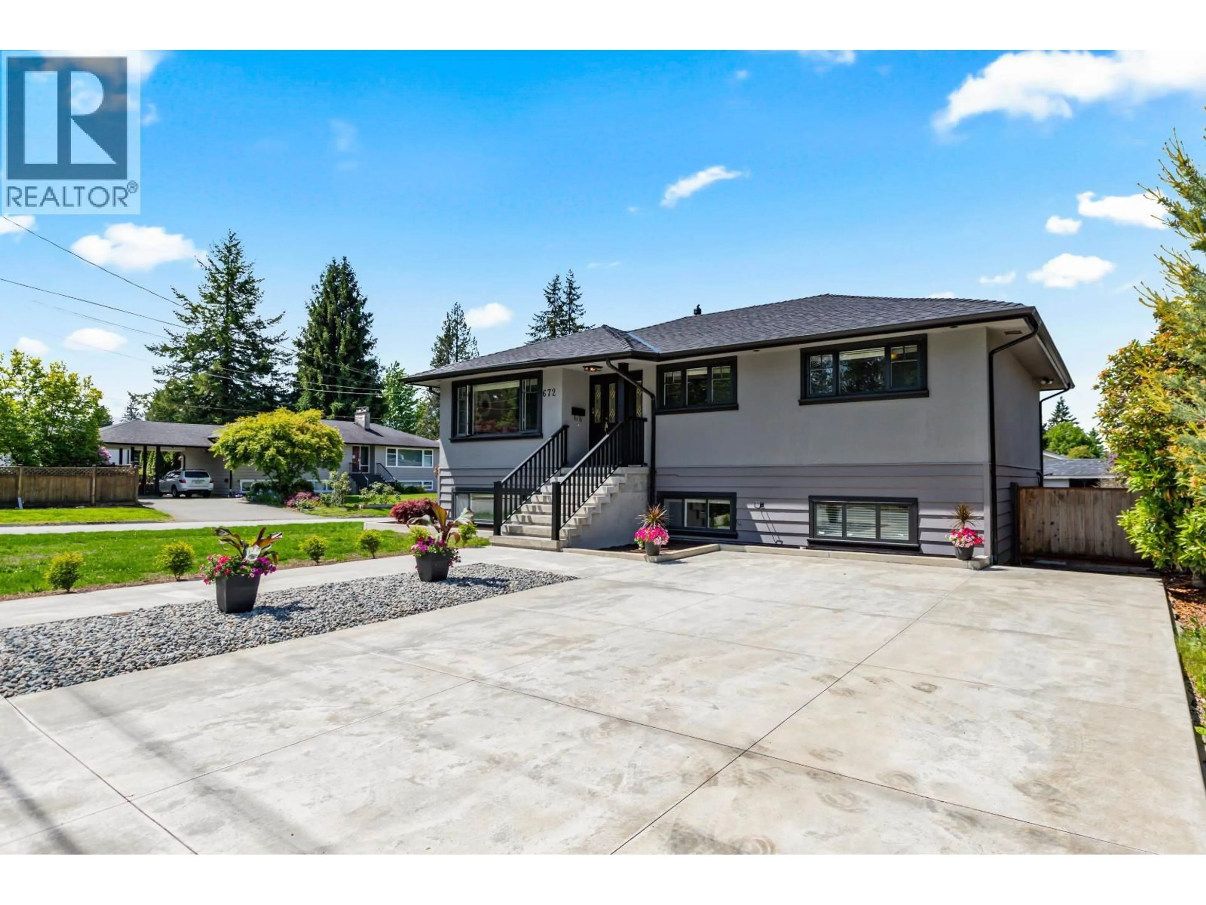 Home with vinyl exterior material, street for 672 WILMOT STREET, Coquitlam British Columbia V3J6P4
