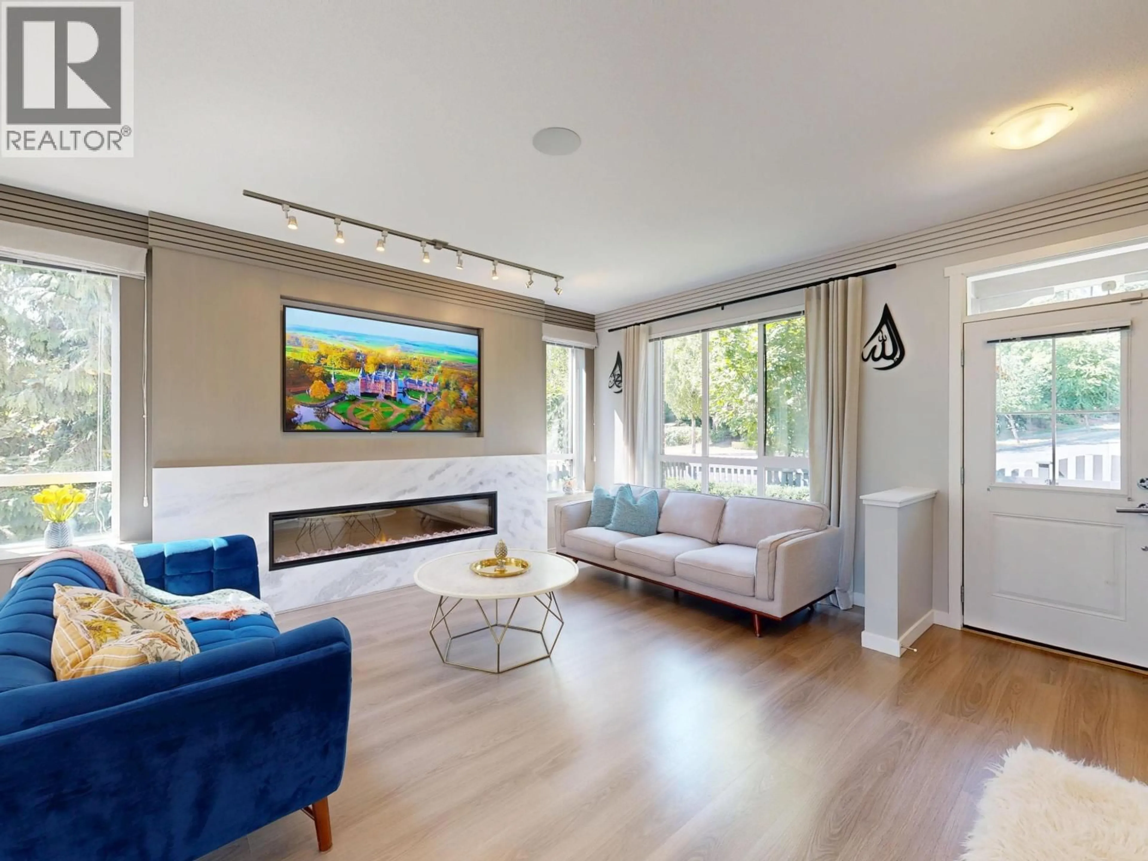 Living room with furniture, unknown for 1 - 3500 BURKE VILLAGE PROMENADE, Coquitlam British Columbia V3E0N2