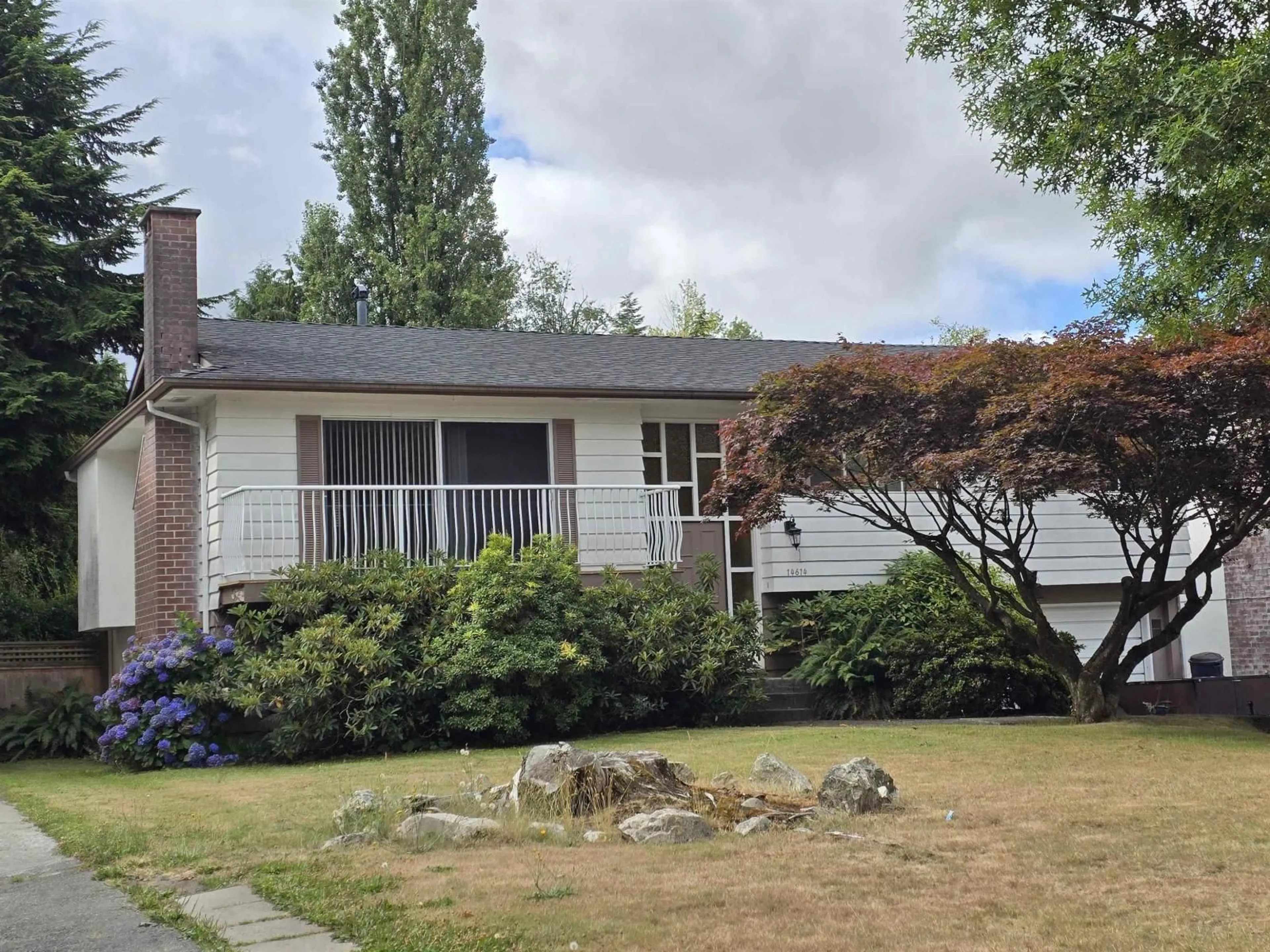 Home with vinyl exterior material, street for 14614 106TH, Surrey British Columbia V3R5Y1