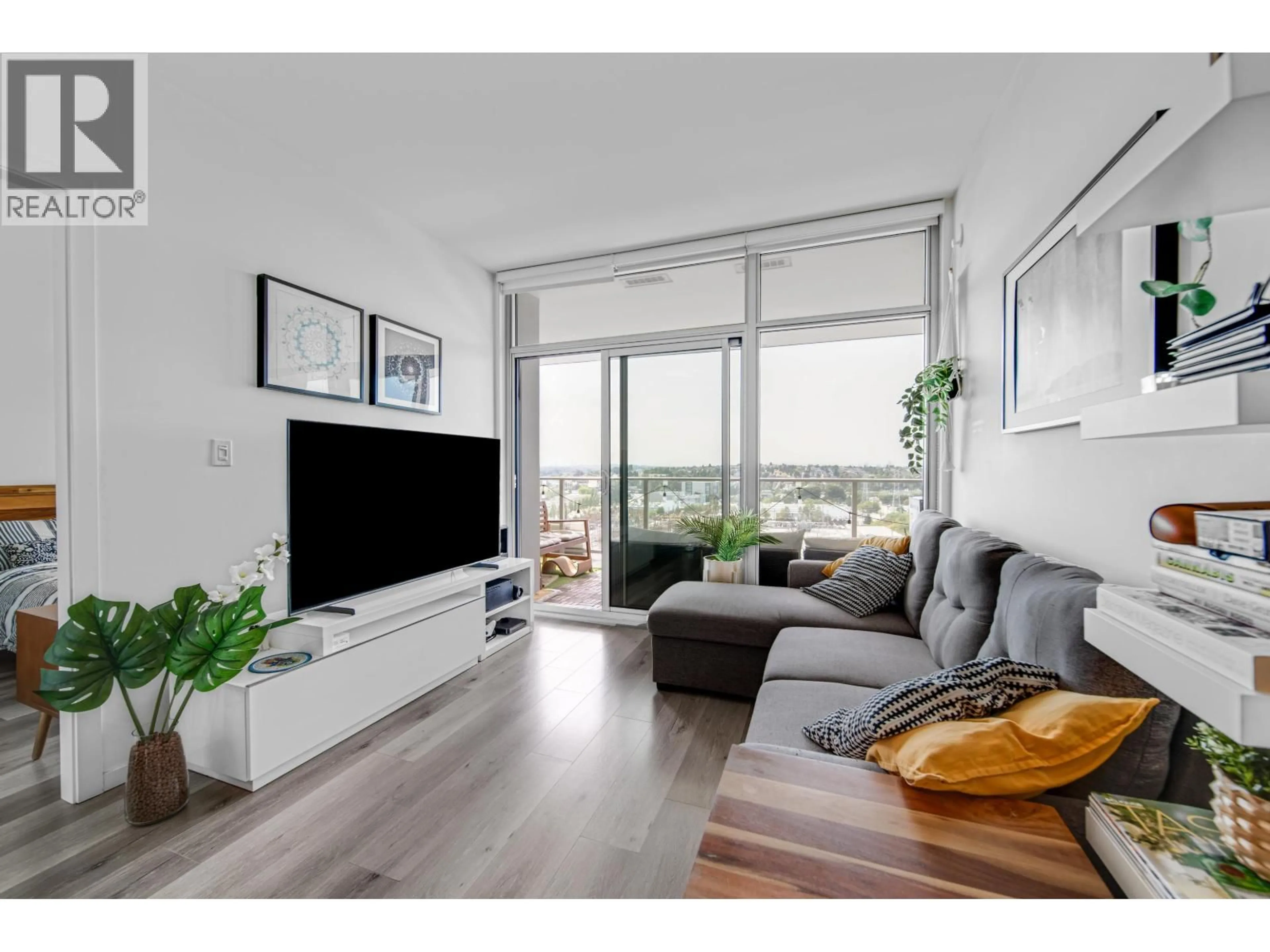 Living room with furniture, wood/laminate floor for 1308 - 1888 GILMORE AVENUE, Burnaby British Columbia V5C0L2