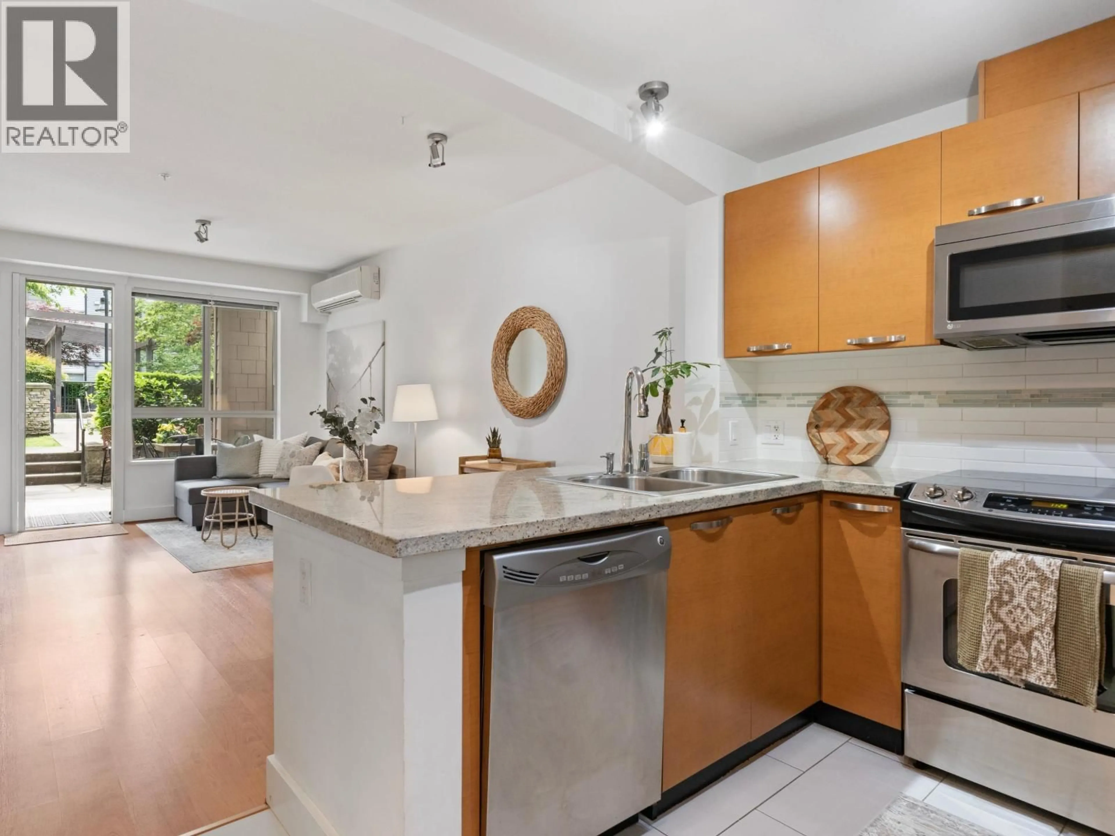 Open concept kitchen, unknown for 208 - 7428 BYRNEPARK WALK, Burnaby British Columbia V3N0B4