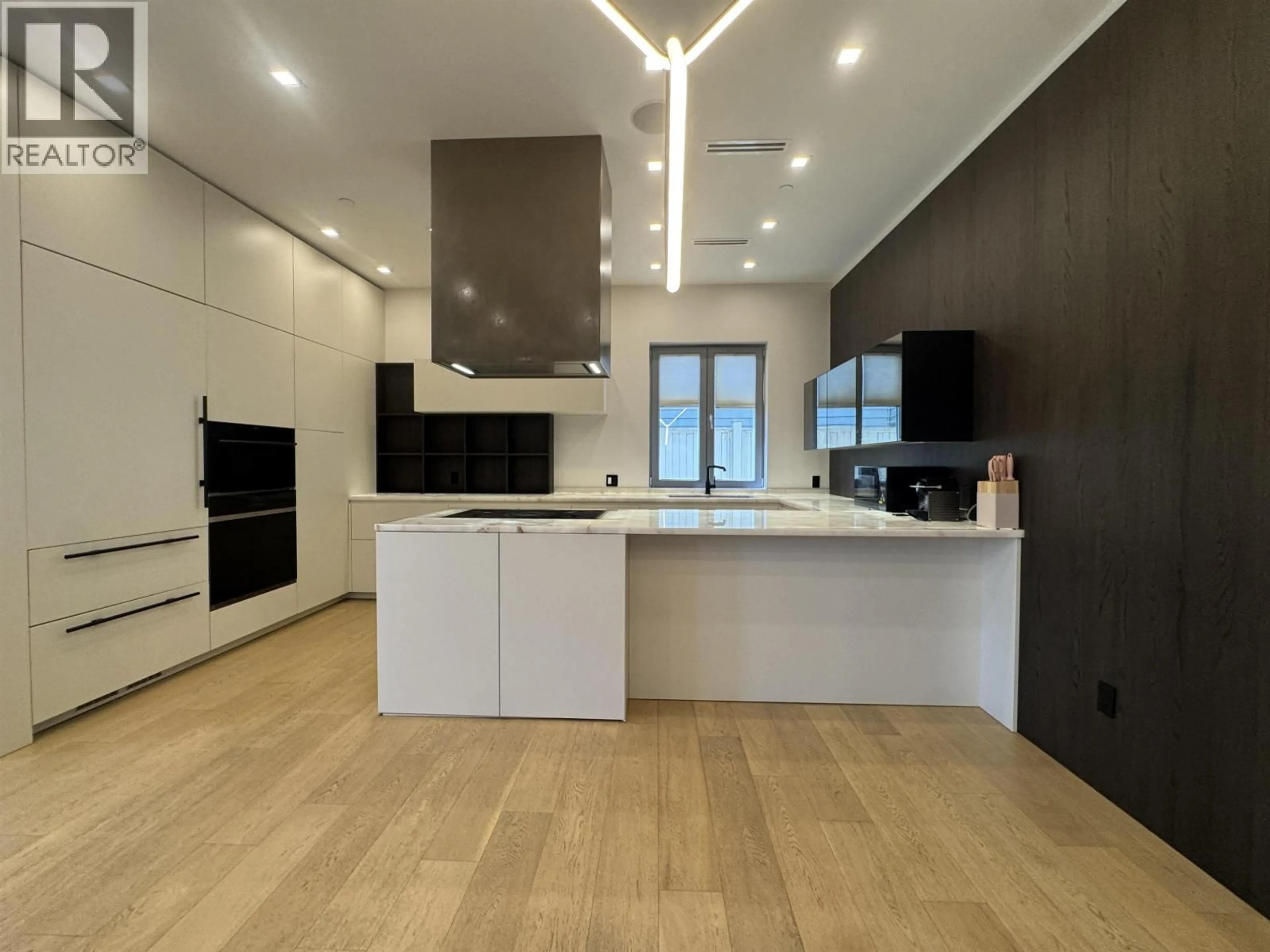 Open concept kitchen, wood/laminate floor for 1076 PARK DRIVE, Vancouver British Columbia V6P2J5