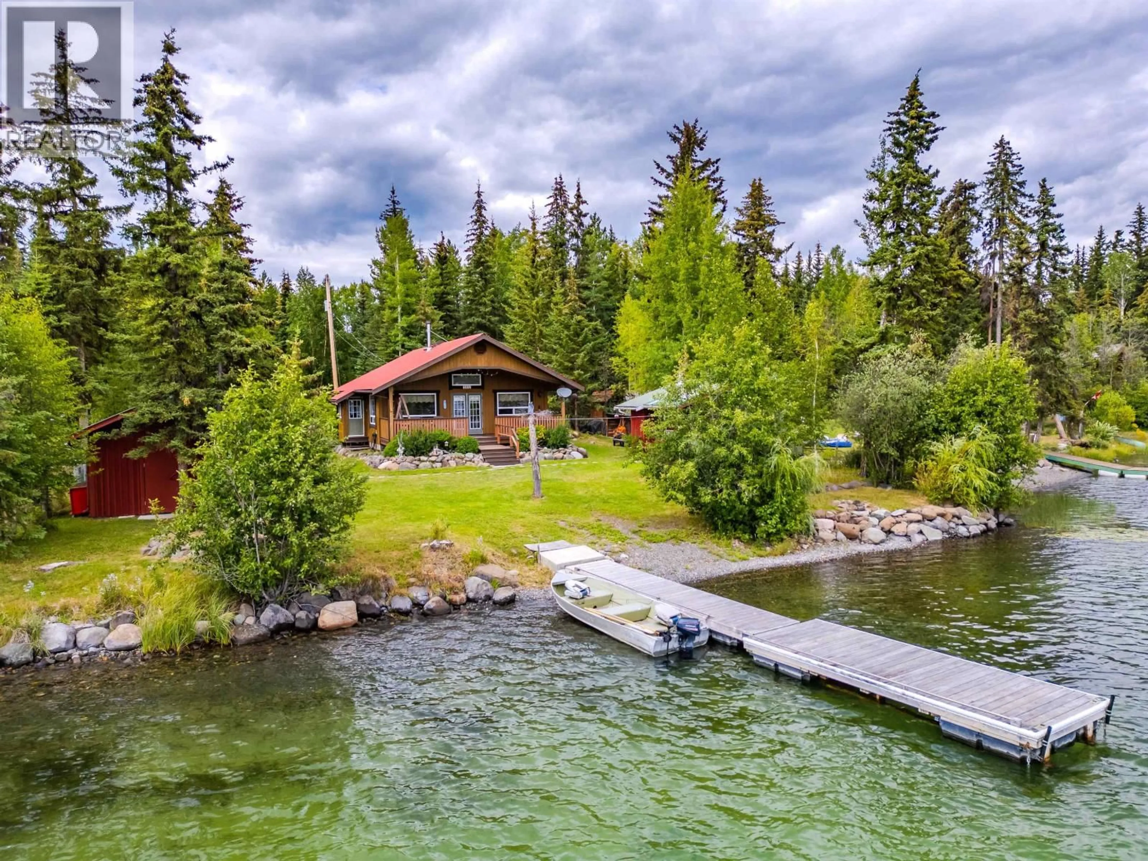 A pic from outside/outdoor area/front of a property/back of a property/a pic from drone, water/lake/river/ocean view for 7213 NATH ROAD, Bridge Lake British Columbia V0K1X1