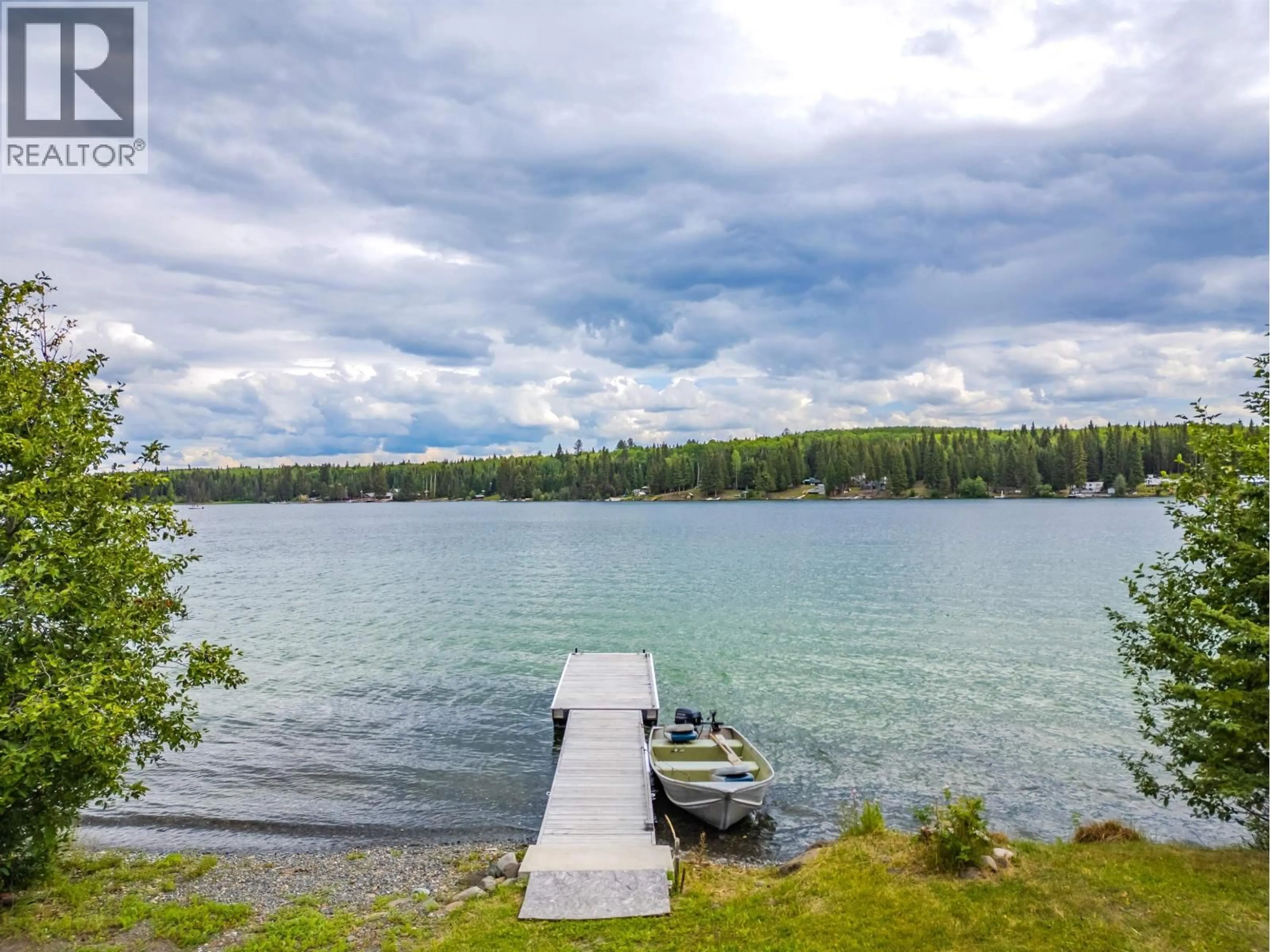 A pic from outside/outdoor area/front of a property/back of a property/a pic from drone, water/lake/river/ocean view for 7213 NATH ROAD, Bridge Lake British Columbia V0K1X1