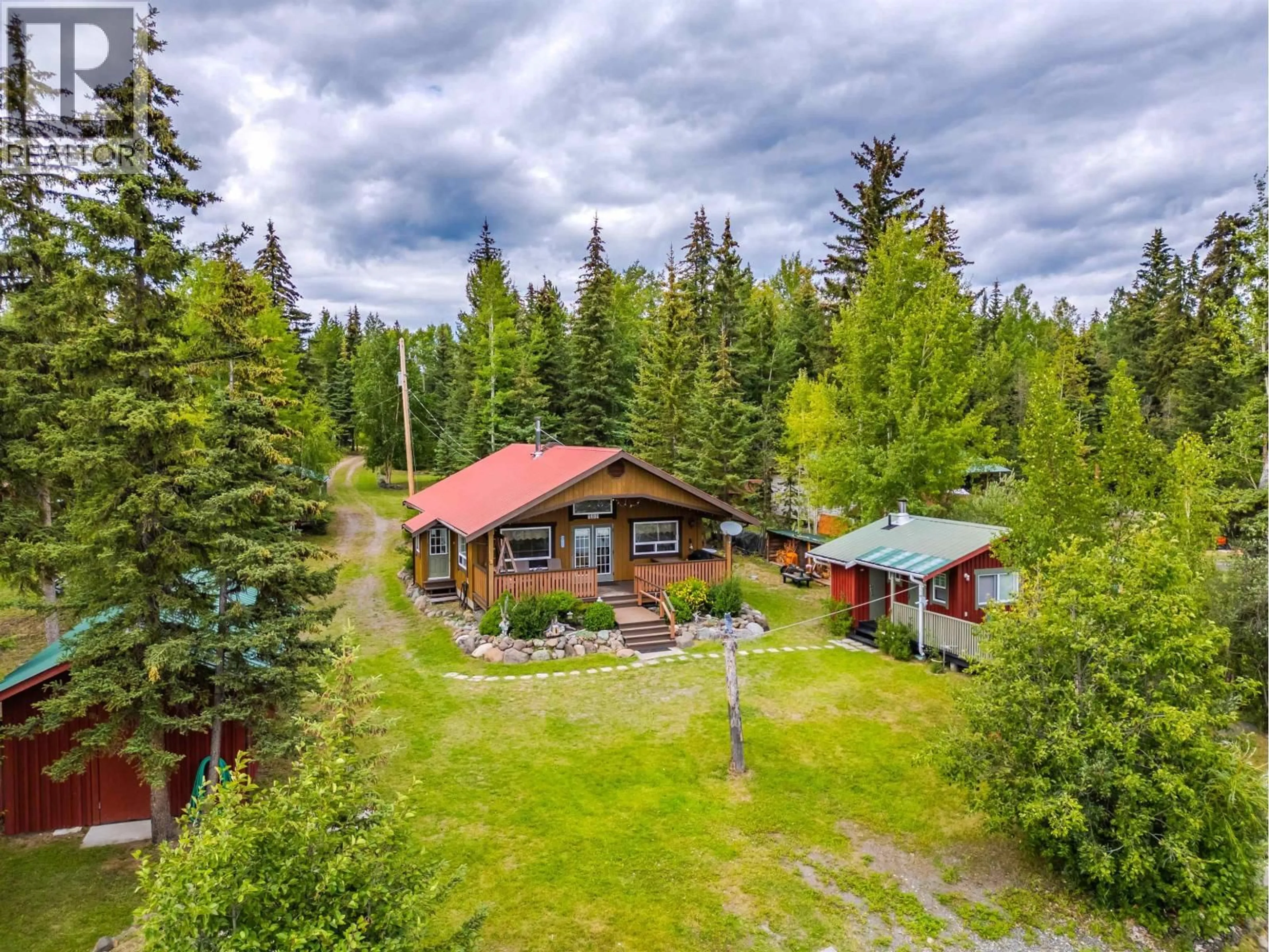 A pic from outside/outdoor area/front of a property/back of a property/a pic from drone, mountain view for 7213 NATH ROAD, Bridge Lake British Columbia V0K1X1