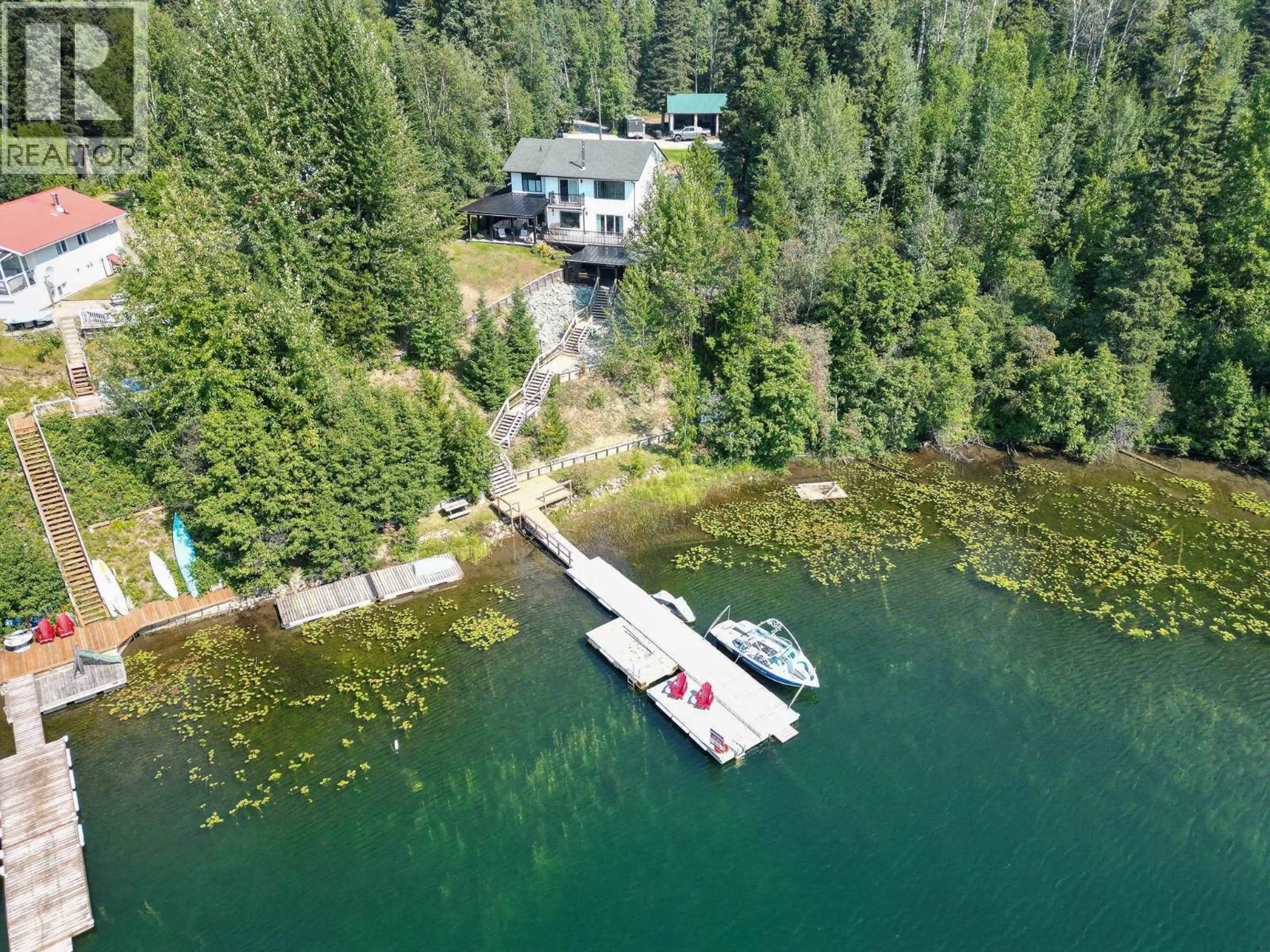 A pic from outside/outdoor area/front of a property/back of a property/a pic from drone, water/lake/river/ocean view for 13010 LAKESIDE DRIVE, Prince George British Columbia V2K5M7