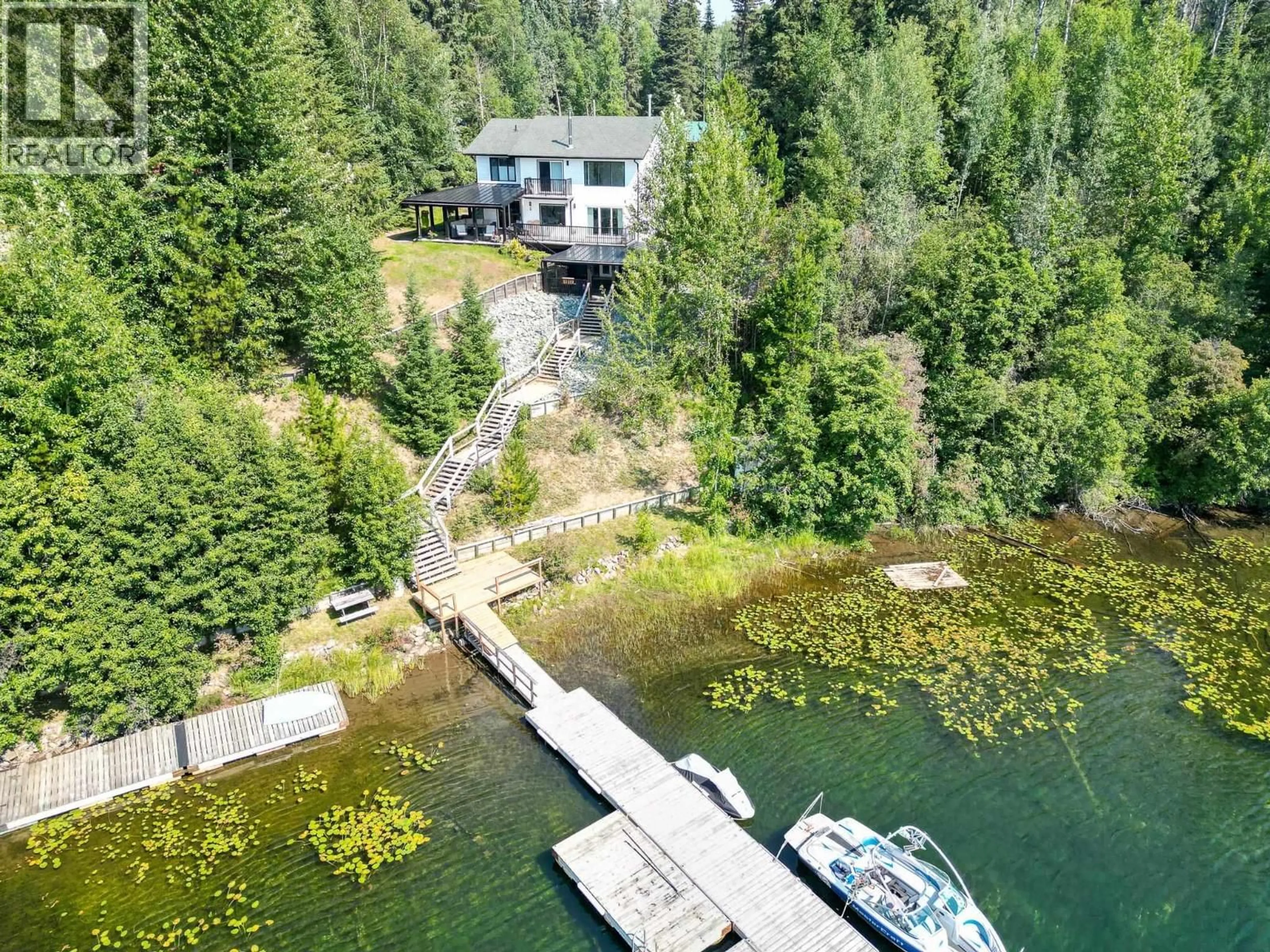 A pic from outside/outdoor area/front of a property/back of a property/a pic from drone, water/lake/river/ocean view for 13010 LAKESIDE DRIVE, Prince George British Columbia V2K5M7