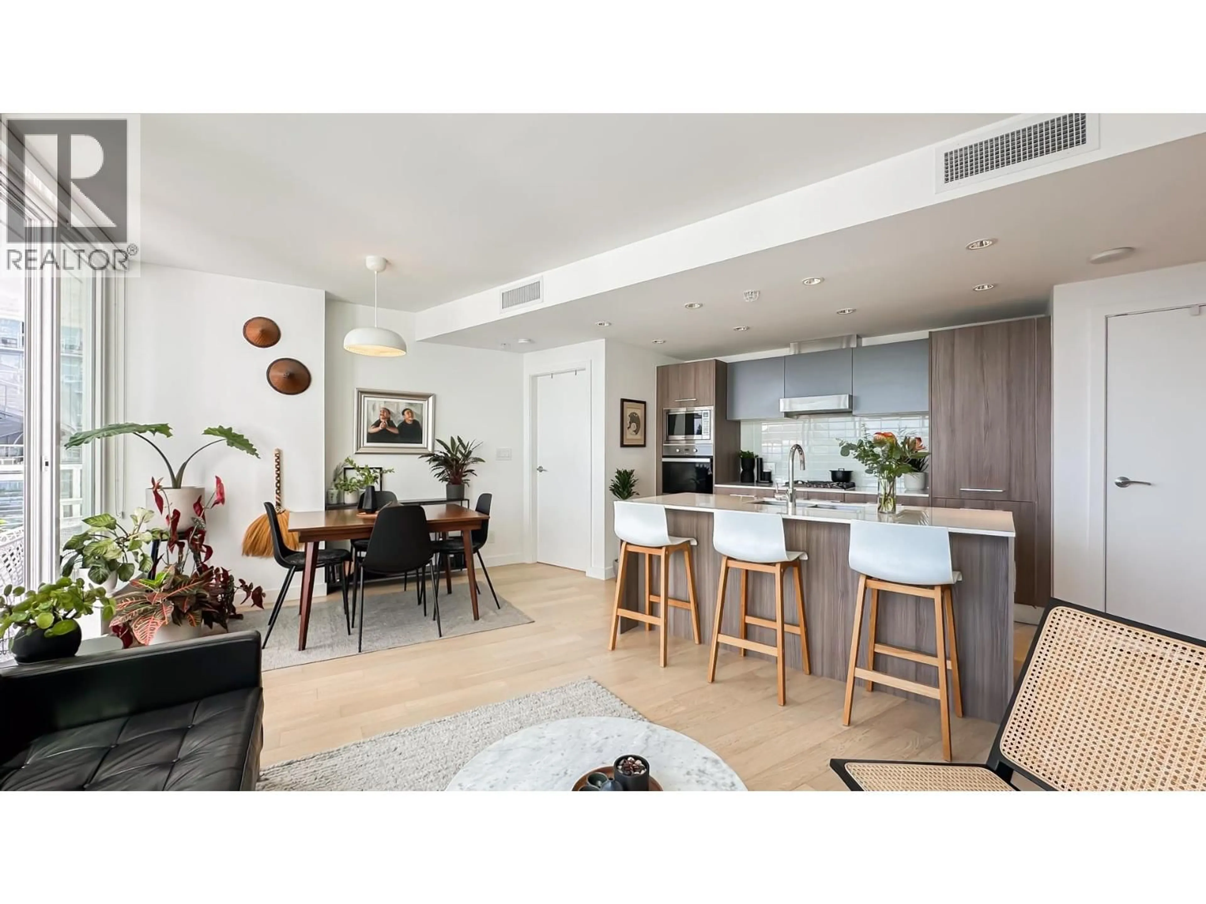 Open concept kitchen, wood/laminate floor for 609 - 4638 GLADSTONE STREET, Vancouver British Columbia V5N0G5