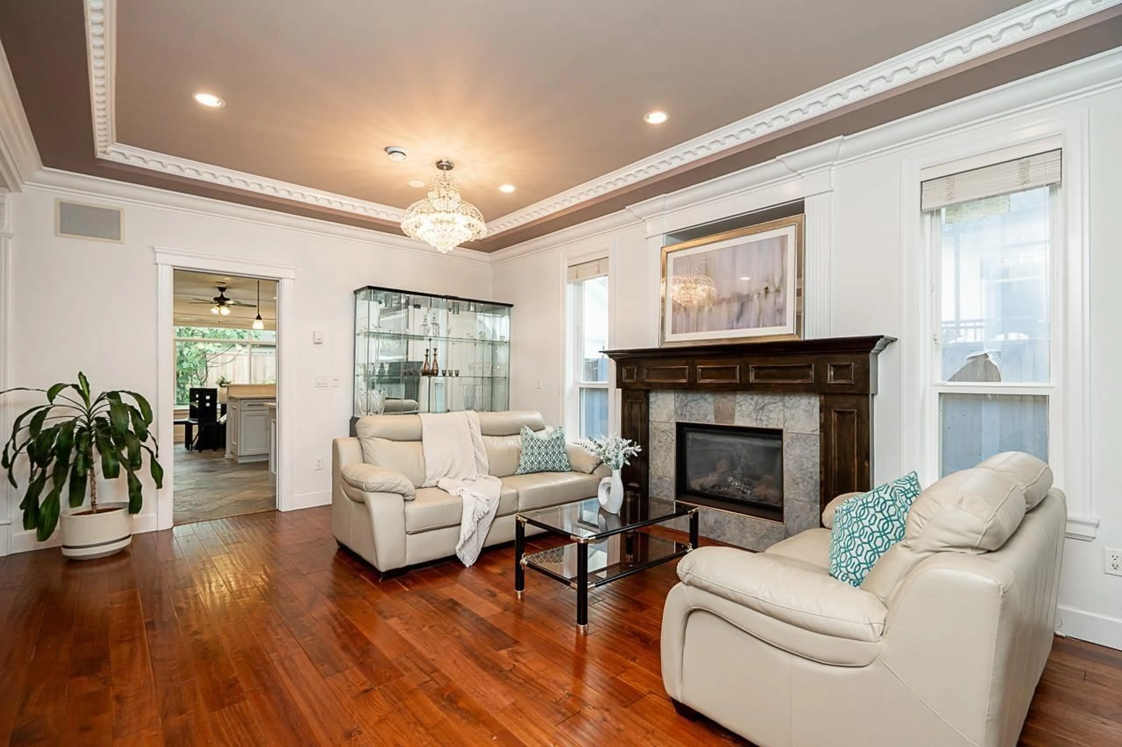 Living room with furniture, wood/laminate floor for 11010 83, Delta British Columbia V4C2G2