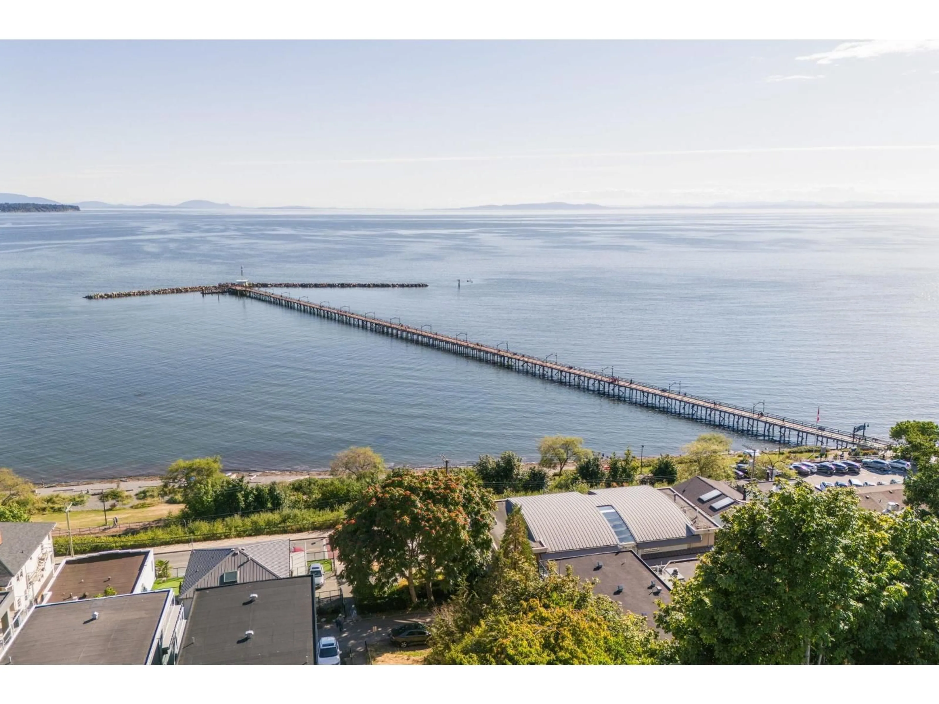 A pic from outside/outdoor area/front of a property/back of a property/a pic from drone, water/lake/river/ocean view for 1 - 14820 BUENA VISTA, White Rock British Columbia V4B0B3
