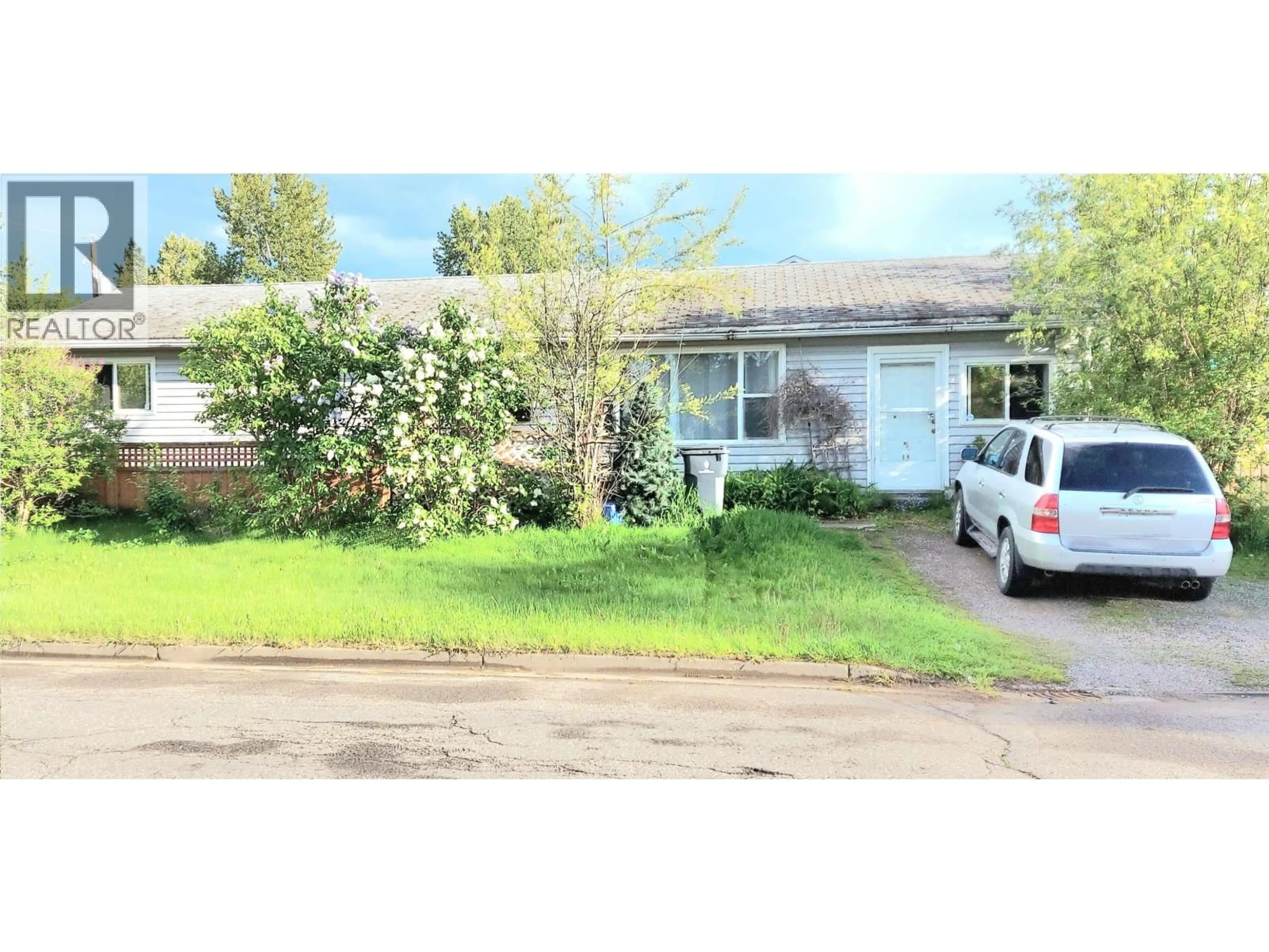 A pic from outside/outdoor area/front of a property/back of a property/a pic from drone, street for 1385 MILBURN AVENUE, Prince George British Columbia V2L4E9