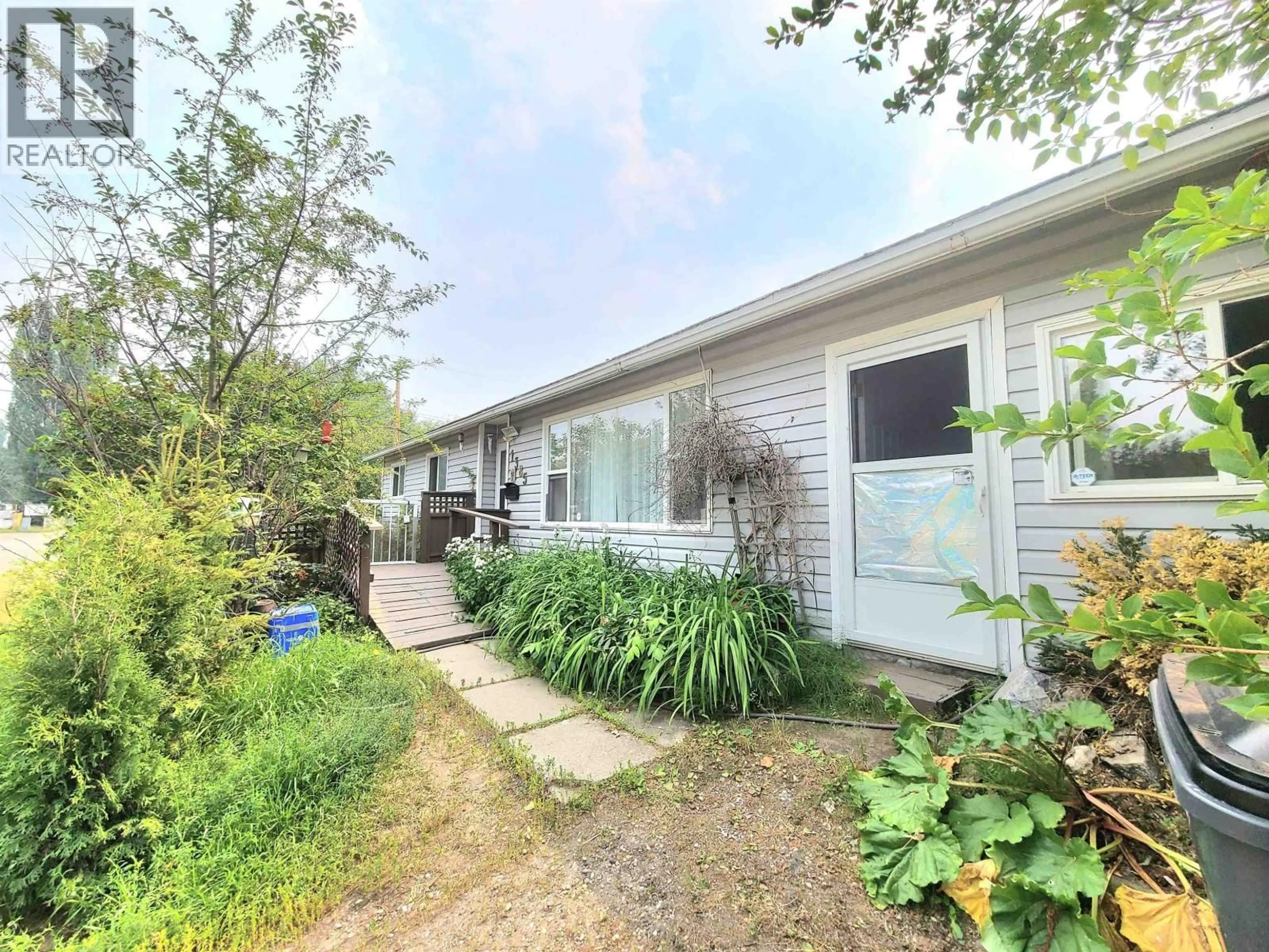 A pic from outside/outdoor area/front of a property/back of a property/a pic from drone, street for 1385 MILBURN AVENUE, Prince George British Columbia V2L4E9