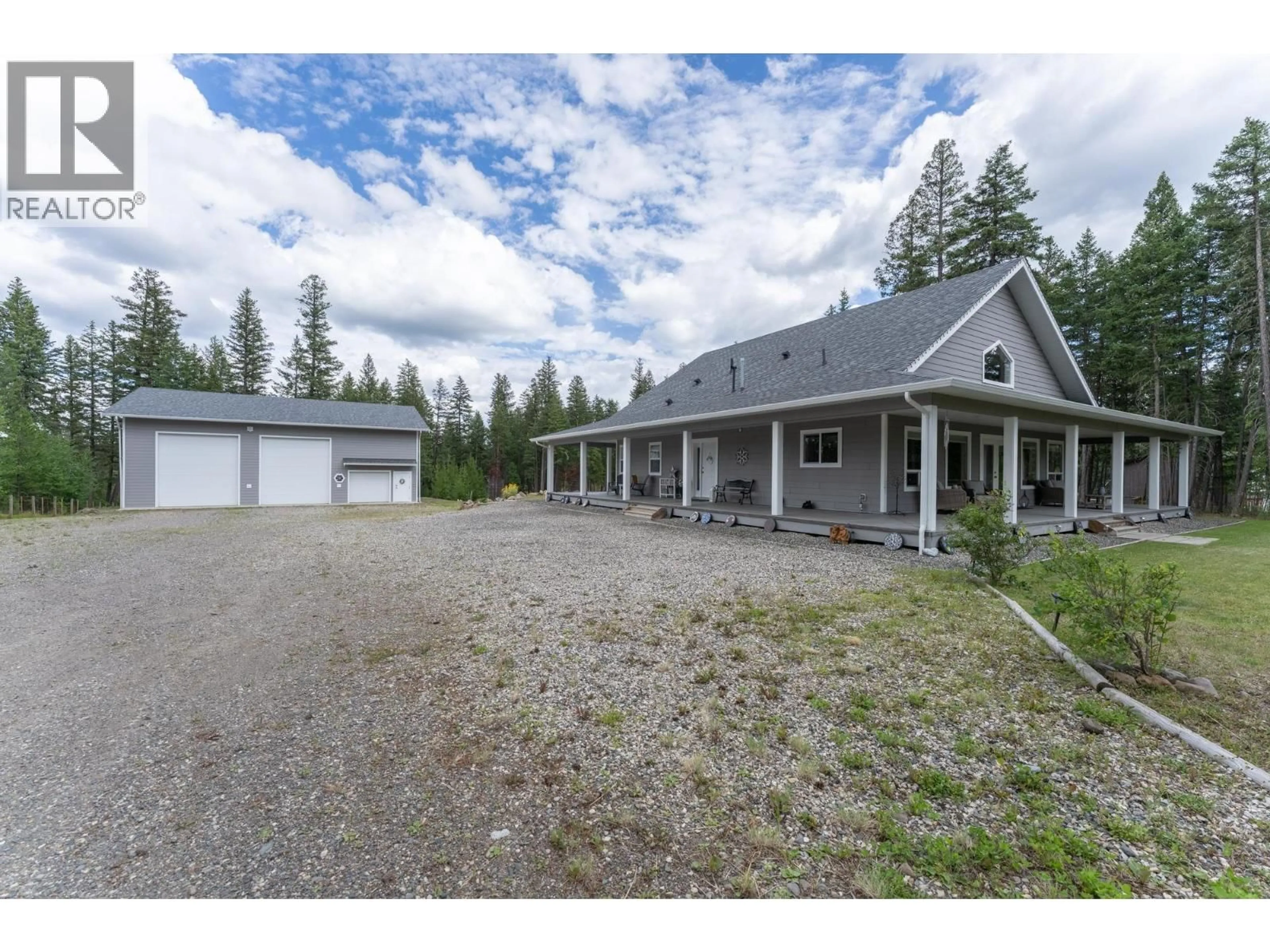 A pic from outside/outdoor area/front of a property/back of a property/a pic from drone, unknown for 48 PTARMIGAN PLACE, 150 Mile House British Columbia V0K2G0