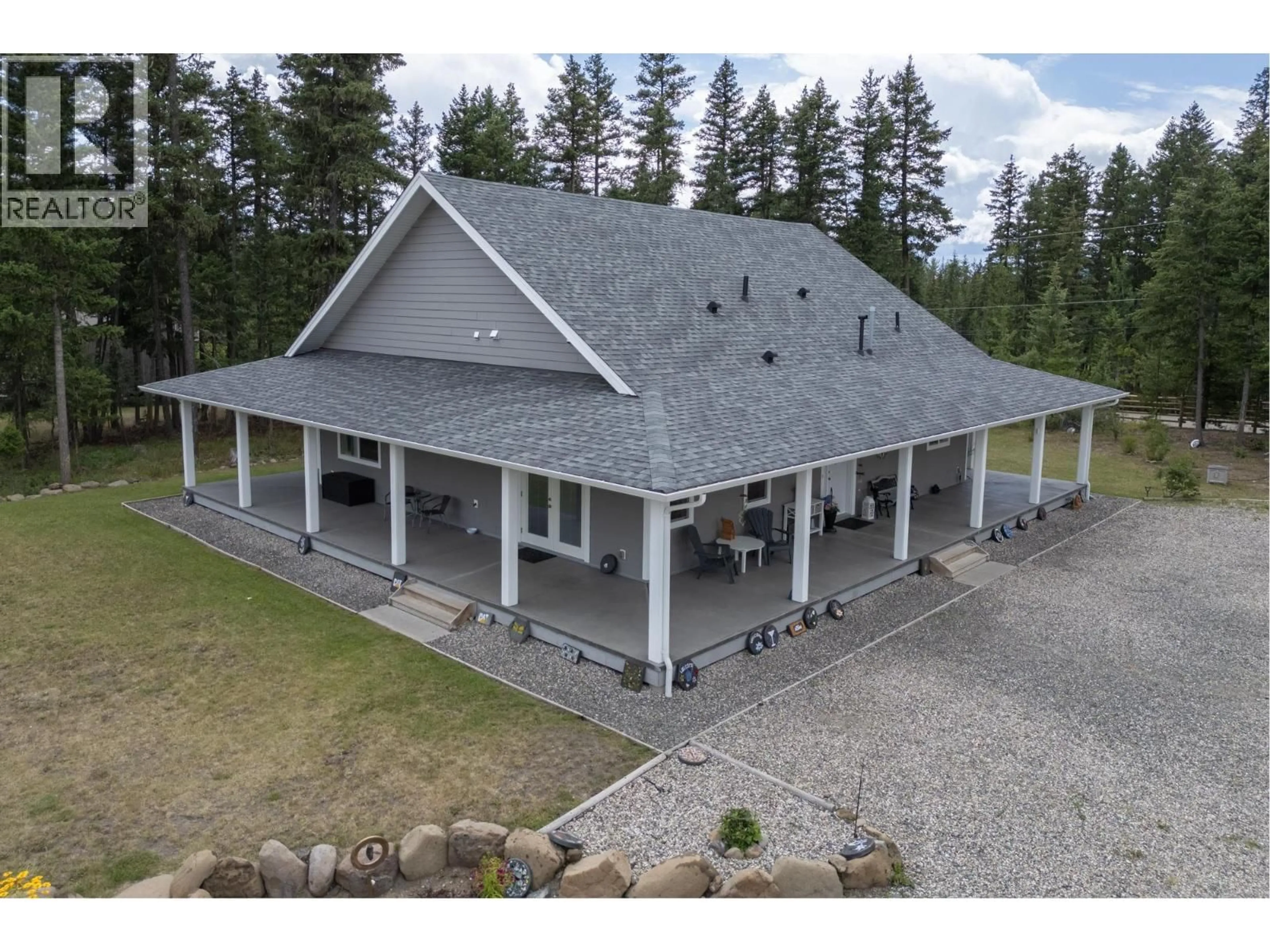A pic from outside/outdoor area/front of a property/back of a property/a pic from drone, building for 48 PTARMIGAN PLACE, 150 Mile House British Columbia V0K2G0