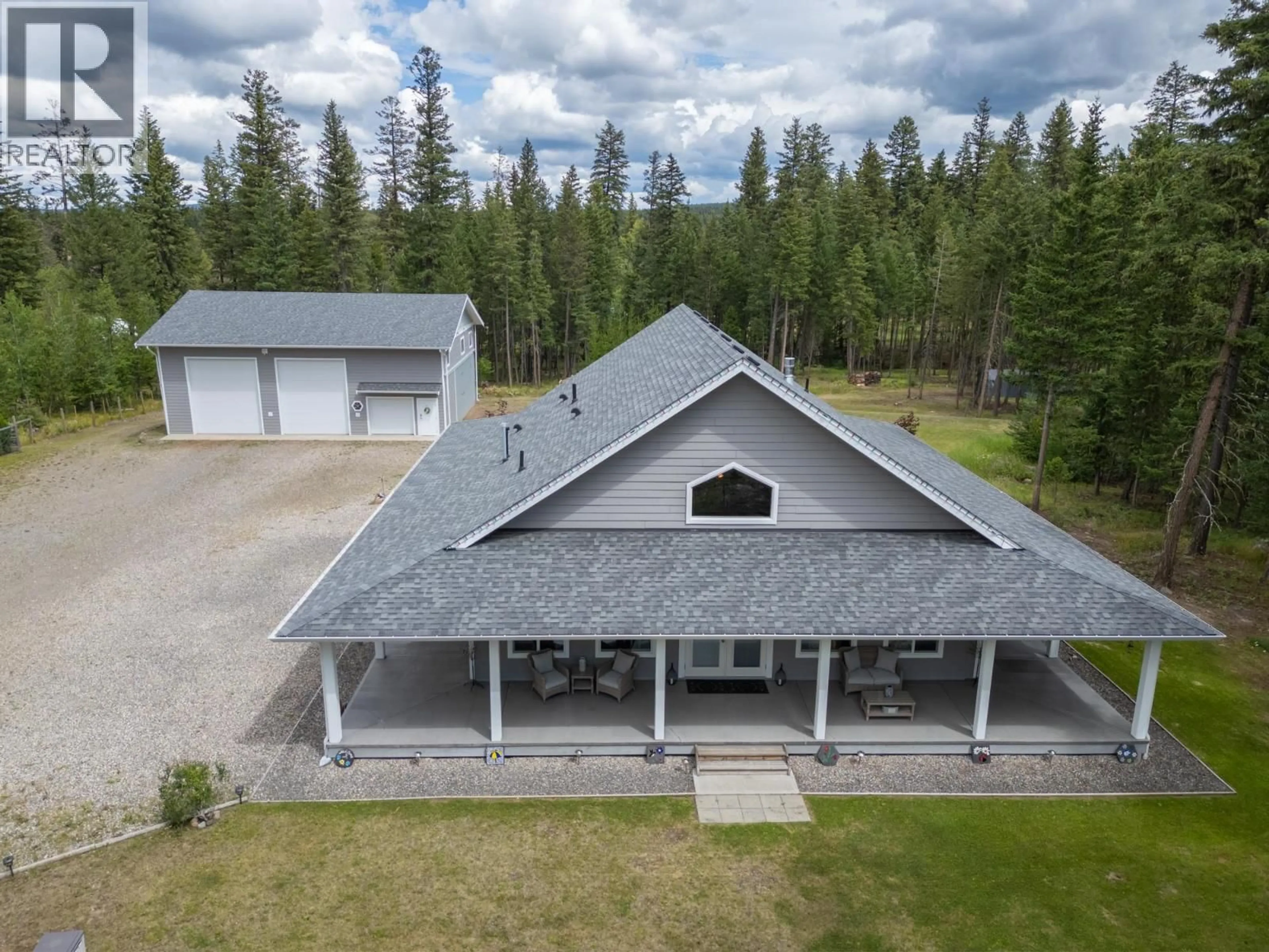 A pic from outside/outdoor area/front of a property/back of a property/a pic from drone, building for 48 PTARMIGAN PLACE, 150 Mile House British Columbia V0K2G0