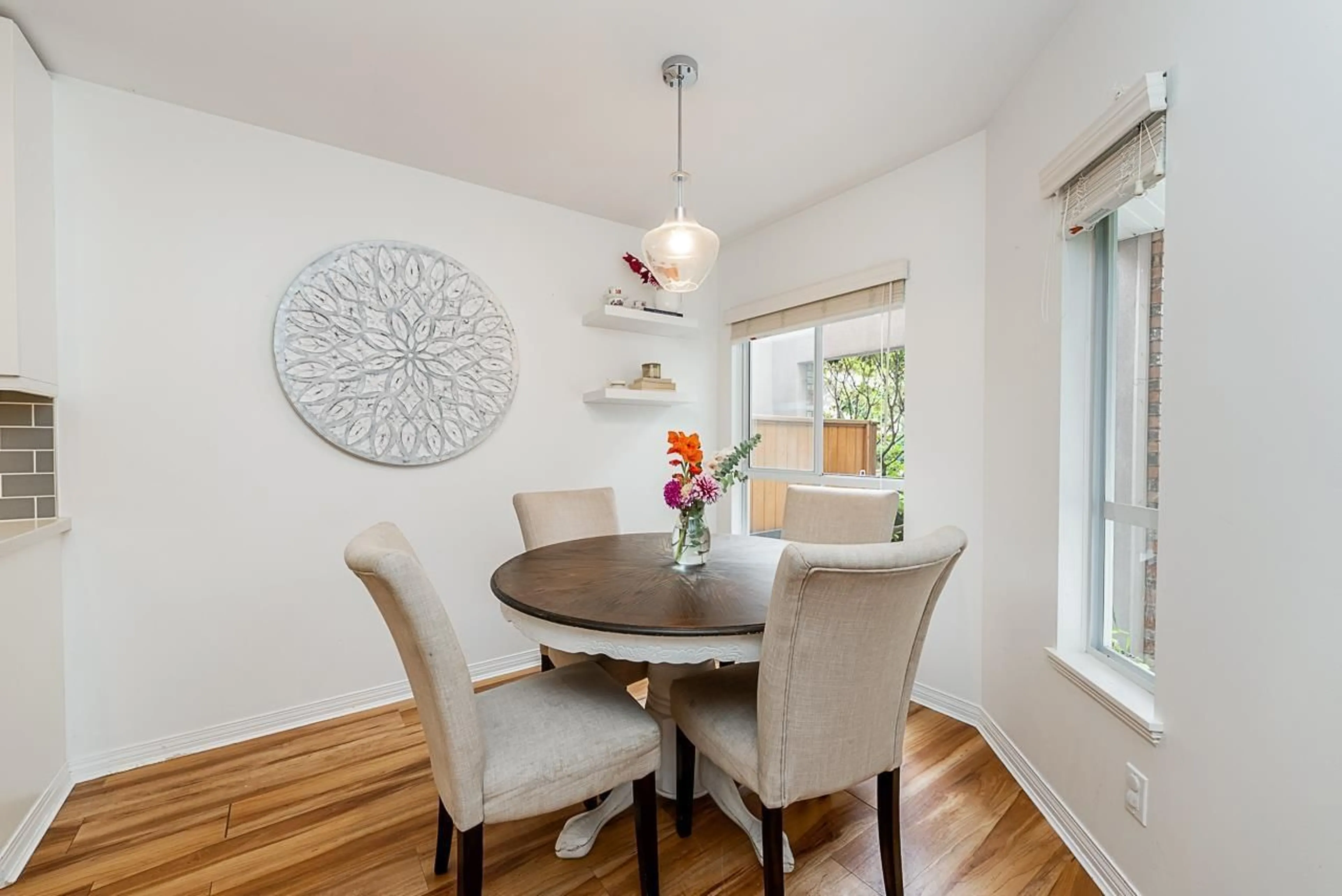 Dining room, wood/laminate floor for 106 - 15550 26, Surrey British Columbia V4P1C6