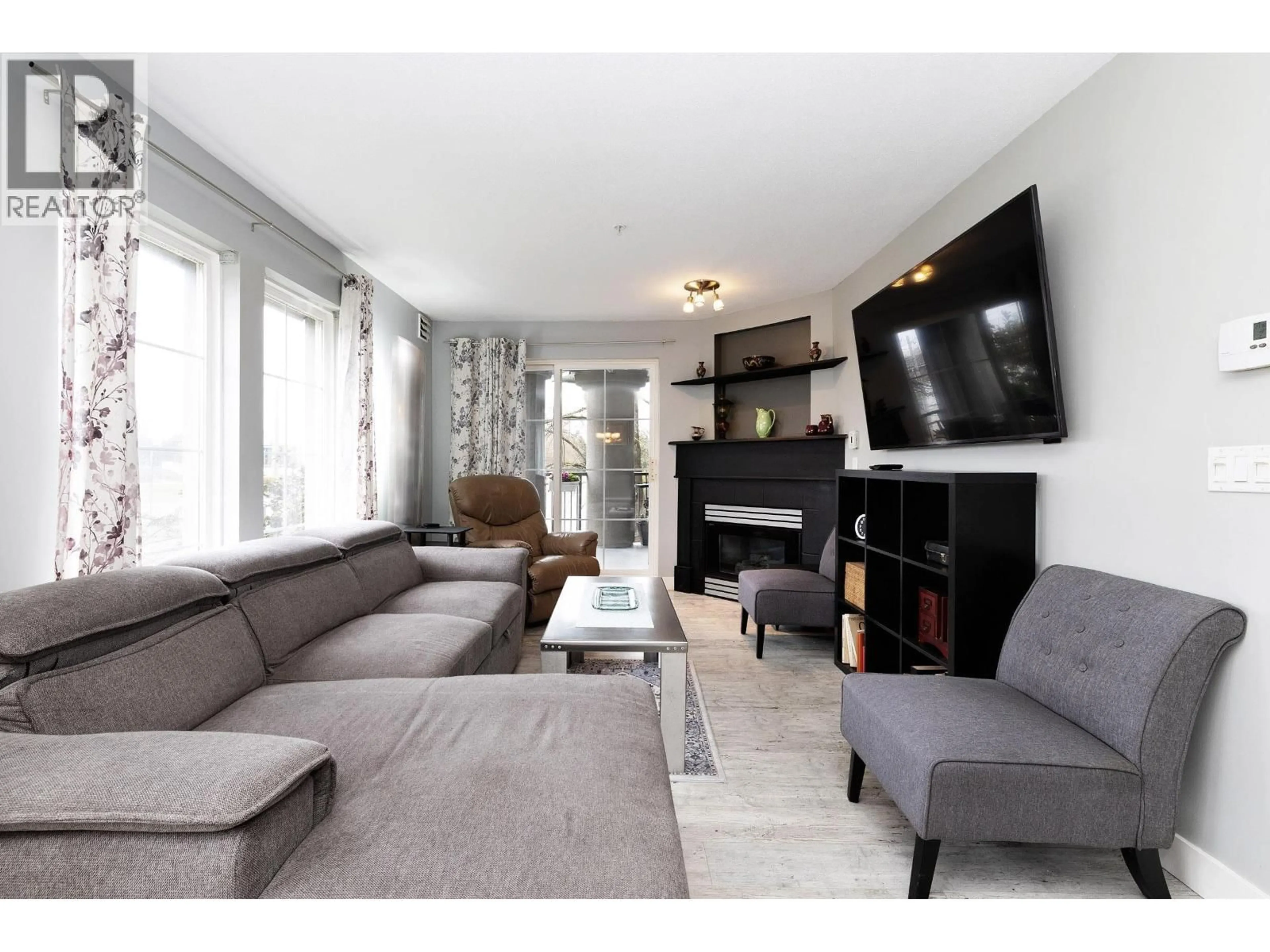 Living room with furniture, unknown for 203 - 1669 GRANT AVENUE, Port Coquitlam British Columbia V3B7W9