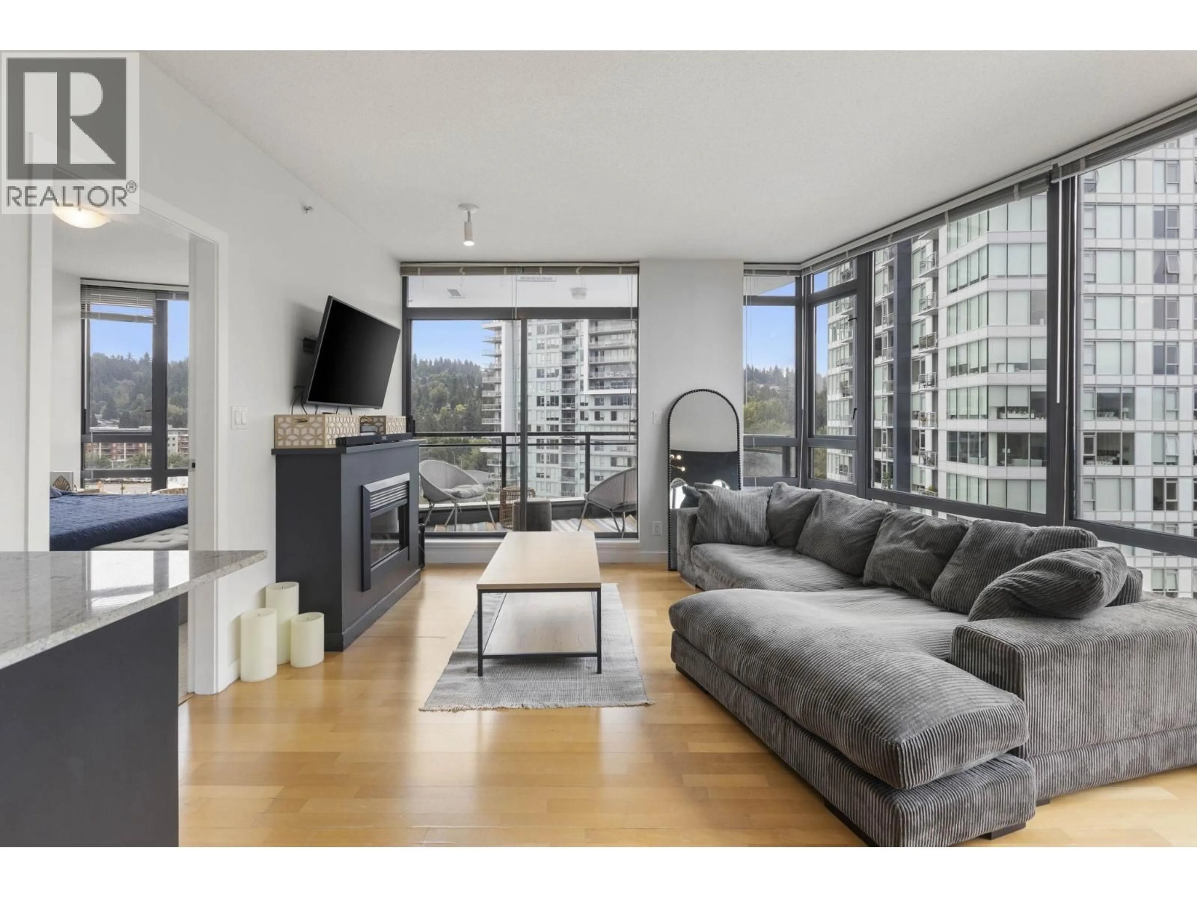 Living room with furniture, unknown for 1104 - 400 CAPILANO ROAD, Port Moody British Columbia V3H0E1