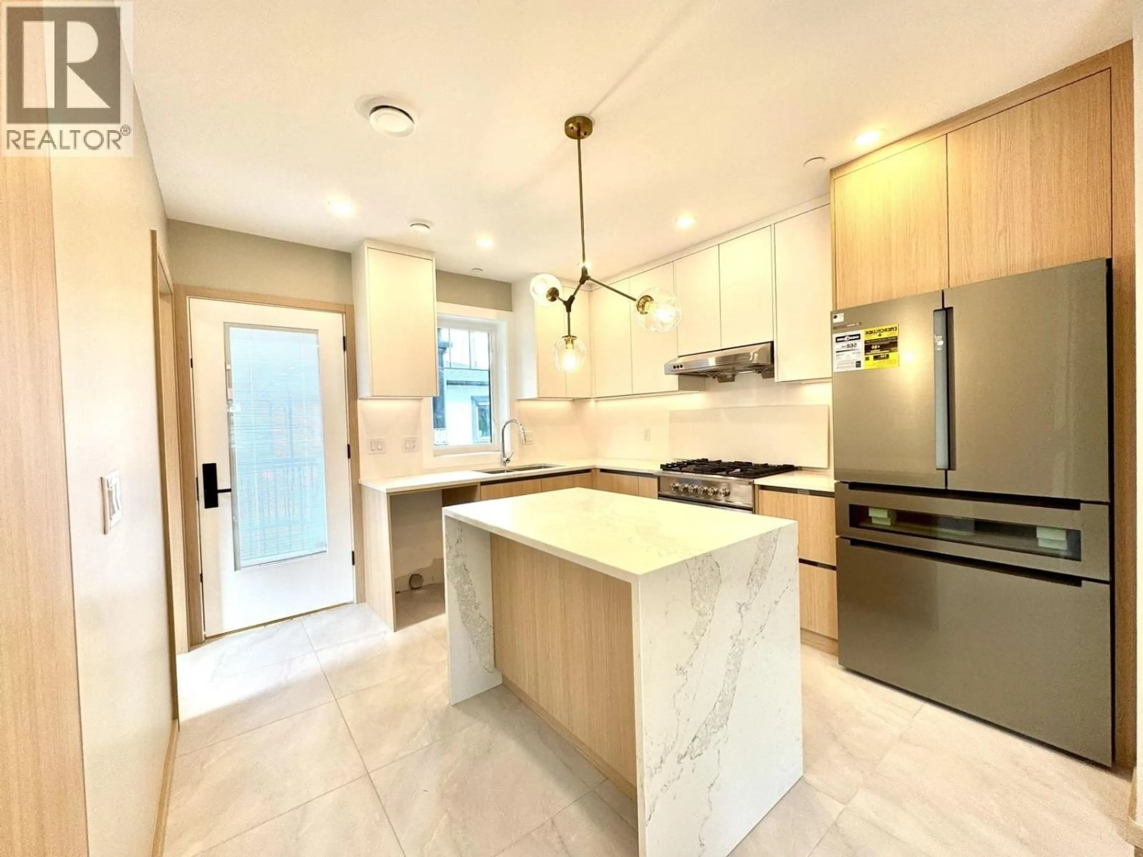 Contemporary kitchen, ceramic/tile floor for 5216 RUPERT STREET, Vancouver British Columbia V5R2J9