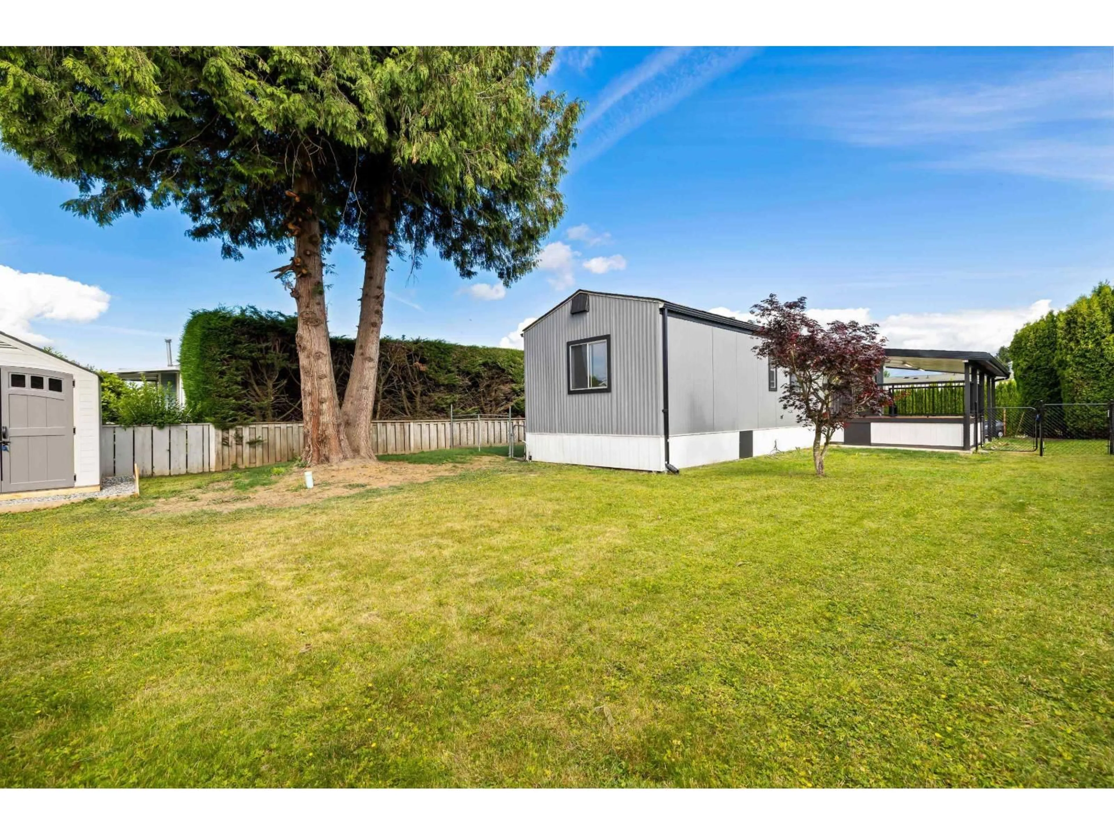 A pic from outside/outdoor area/front of a property/back of a property/a pic from drone, street for 1 - 7610 EVANS ROAD, Chilliwack British Columbia V2R2T4