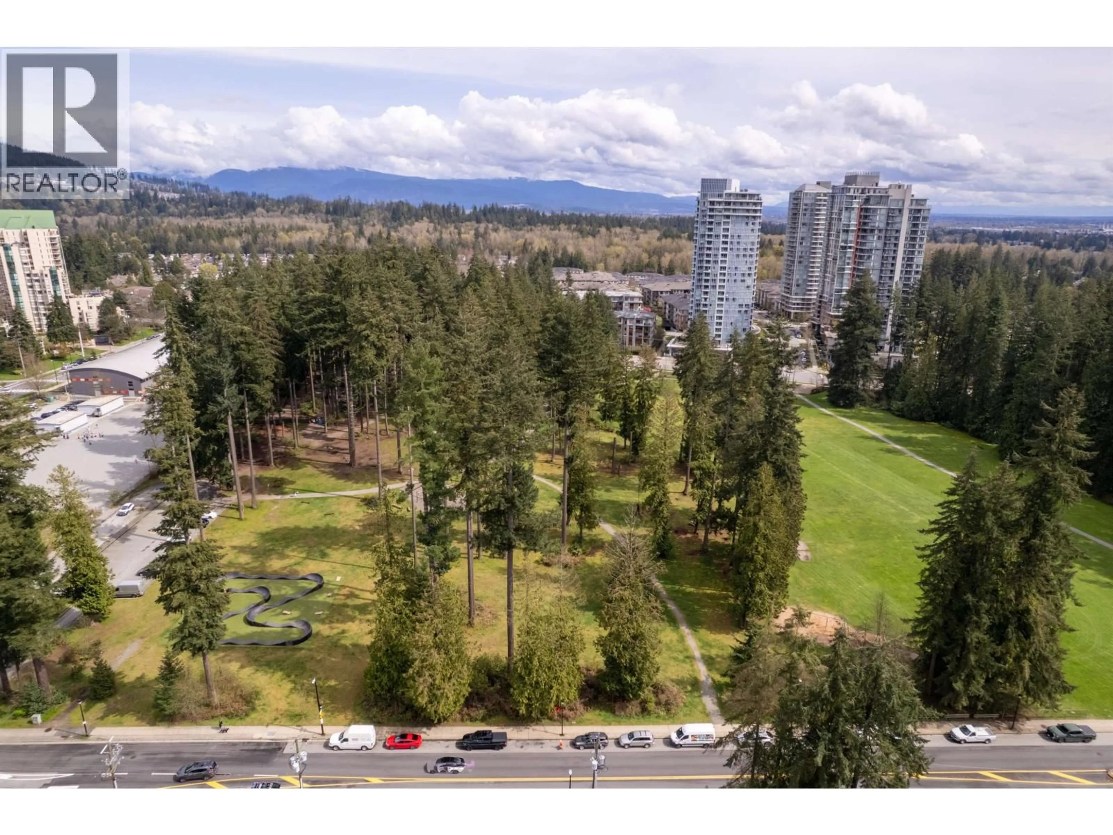 A pic from outside/outdoor area/front of a property/back of a property/a pic from drone, mountain view for 2004 - 1182 WESTWOOD STREET, Coquitlam British Columbia V3B0T9