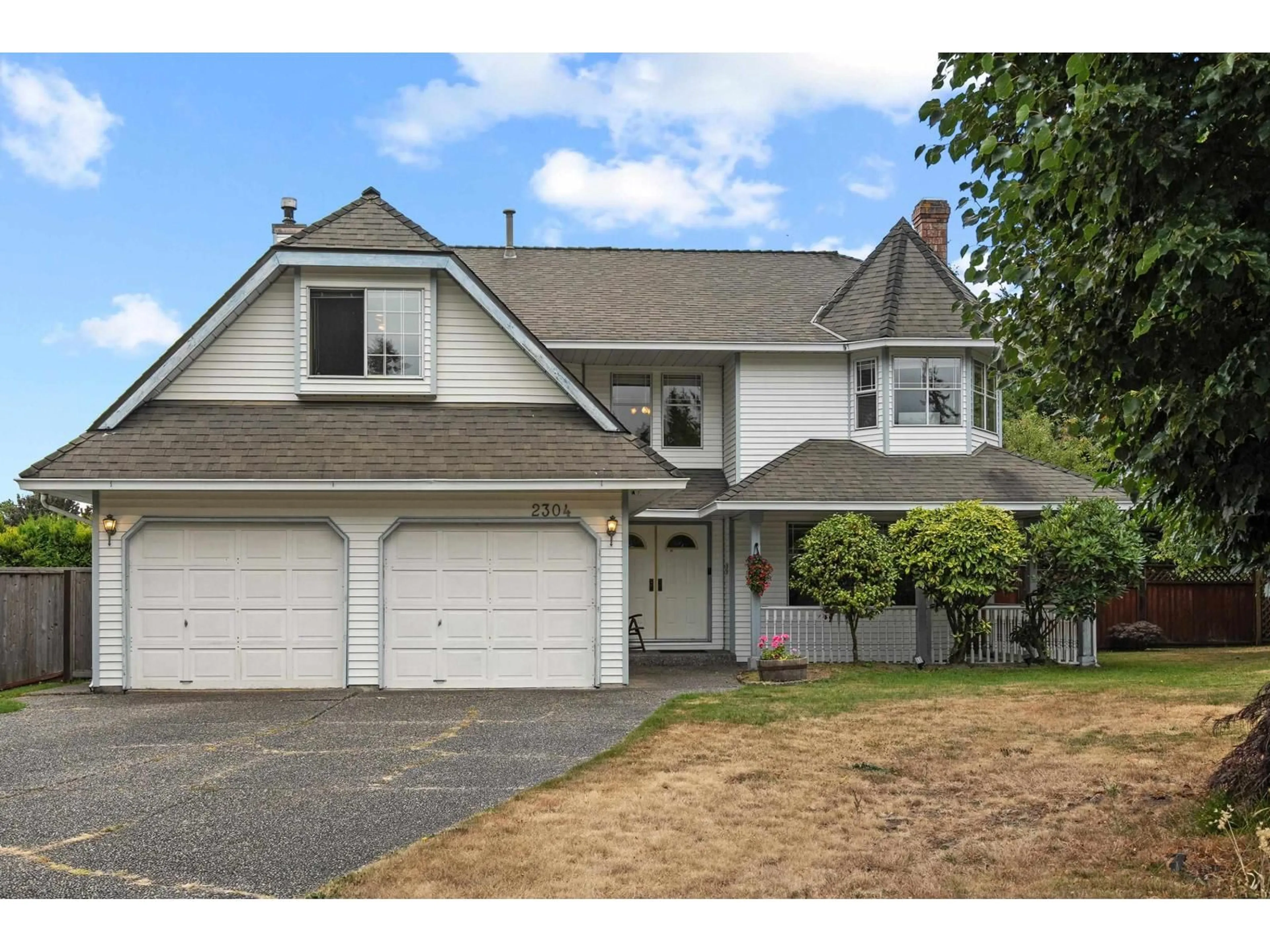 Home with vinyl exterior material, street for 2304 151A, Surrey British Columbia V4A8S9