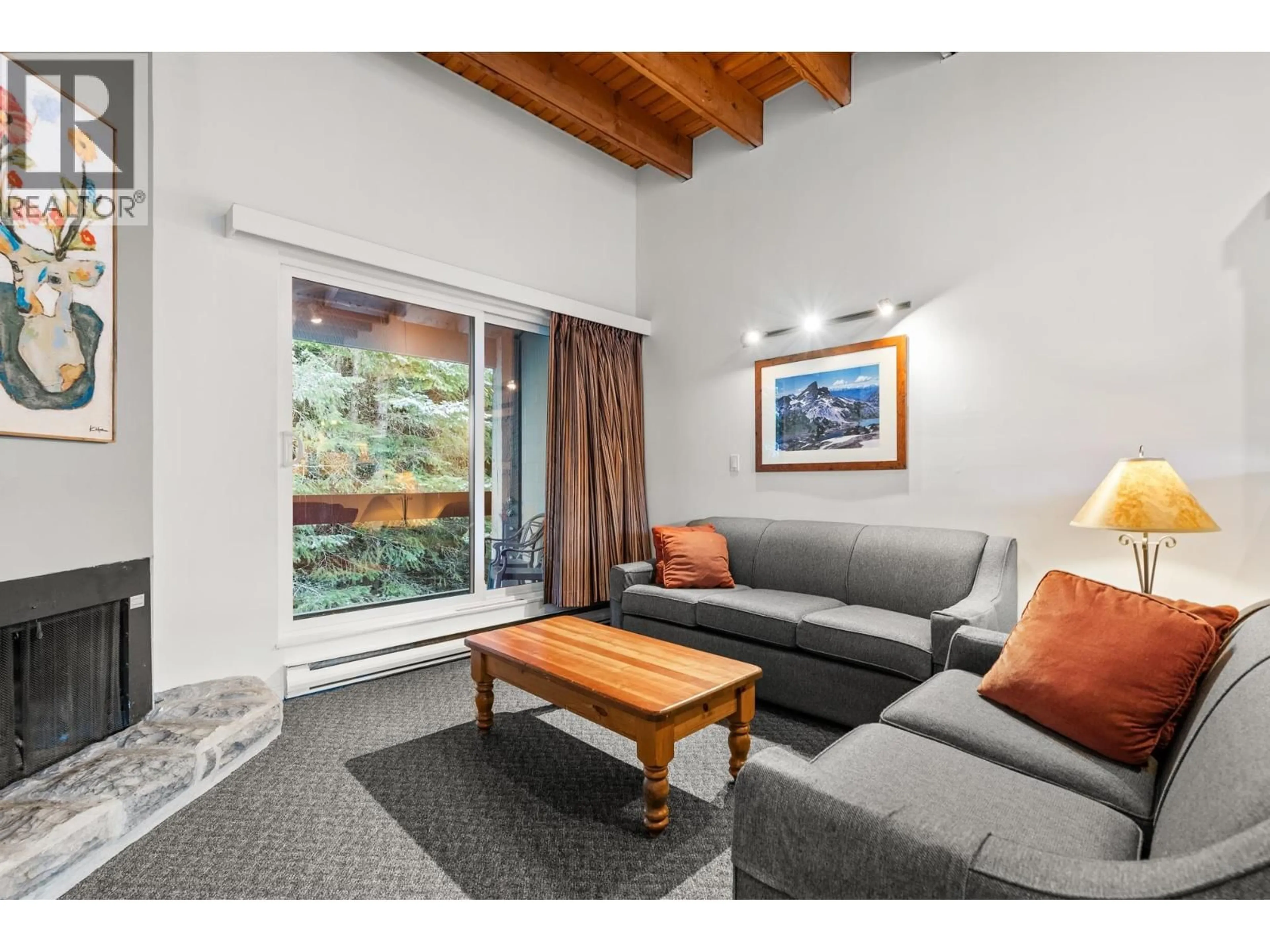 Living room with furniture, unknown for 513 - 4200 WHISTLER WAY, Whistler British Columbia V8E1J4